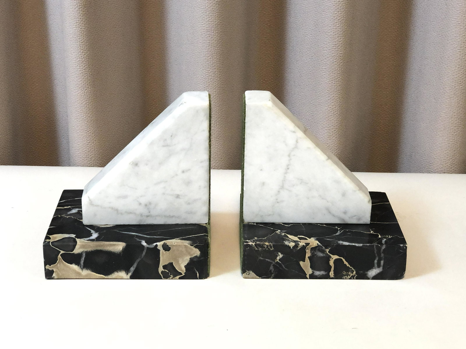 Pair of Deco Marble Bookends: Each 5" high. IMPORTANT: Before bidding, please read the terms and conditions. When you registered for the auction you agreed to these terms and will be required to comply with them.