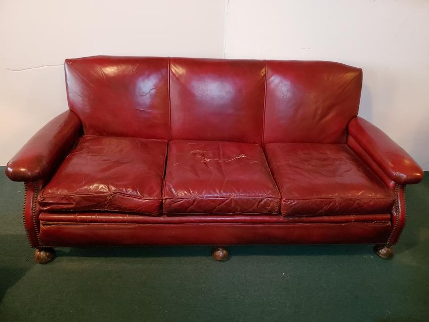 Decker Leather Sofa: 76" wide X 36" wide X 32" high. Leather has cracks and splits. IMPORTANT: Before bidding, please read the terms and conditions. When you registered for the auction you agreed to these terms and will b