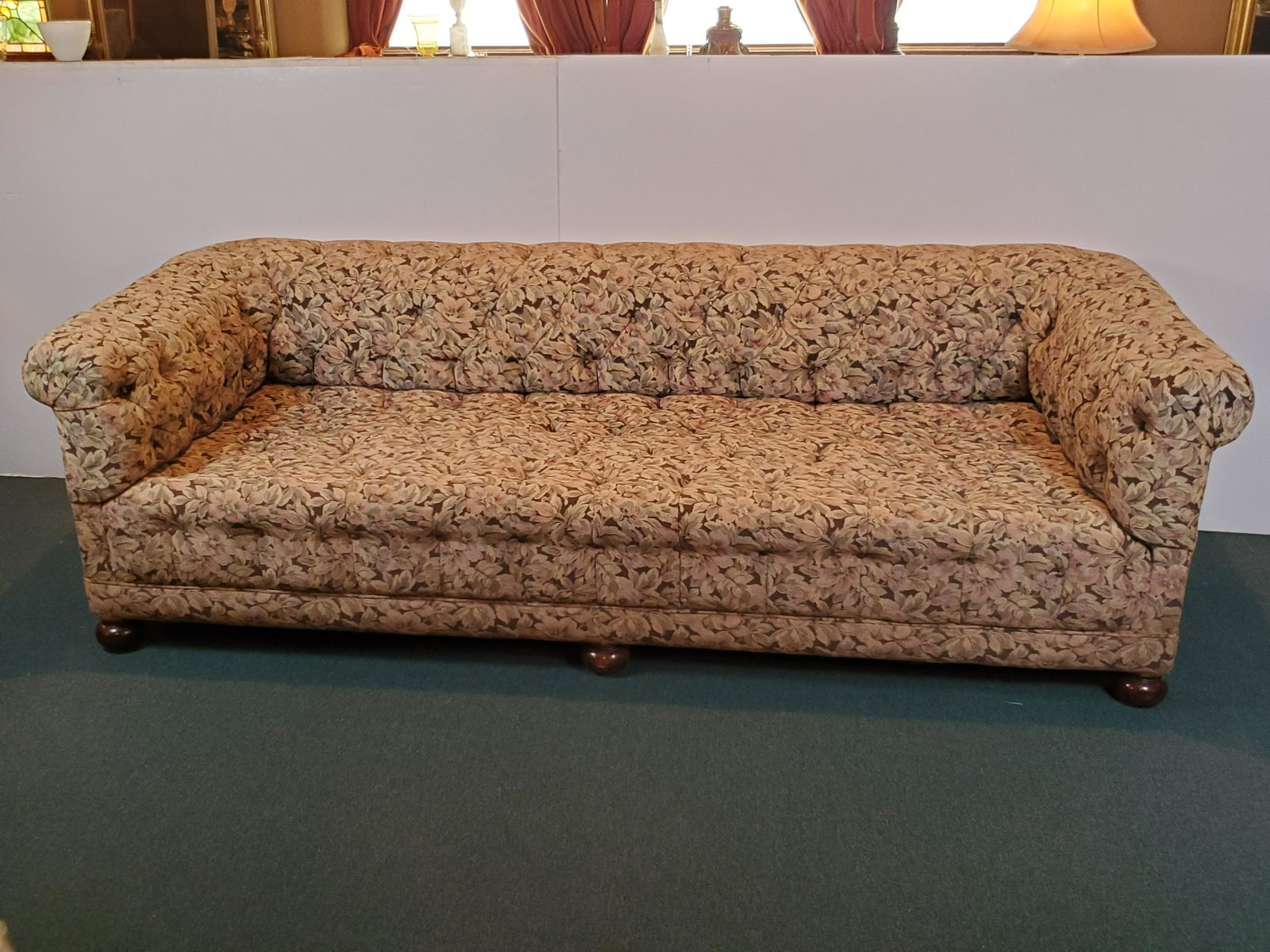 Flower Print Chesterfield: Good condition. 100" wide X 38" deep X 30" high. IMPORTANT: Before bidding, please read the terms and conditions. When you registered for the auction you agreed to these terms and will be required to 