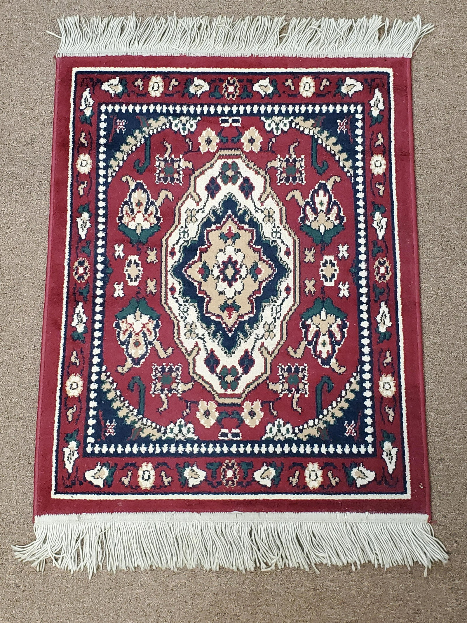 Small Area Rug: 32" wide X 41" long. IMPORTANT: Before bidding, please read the terms and conditions. When you registered for the auction you agreed to these terms and will be required to comply with them.