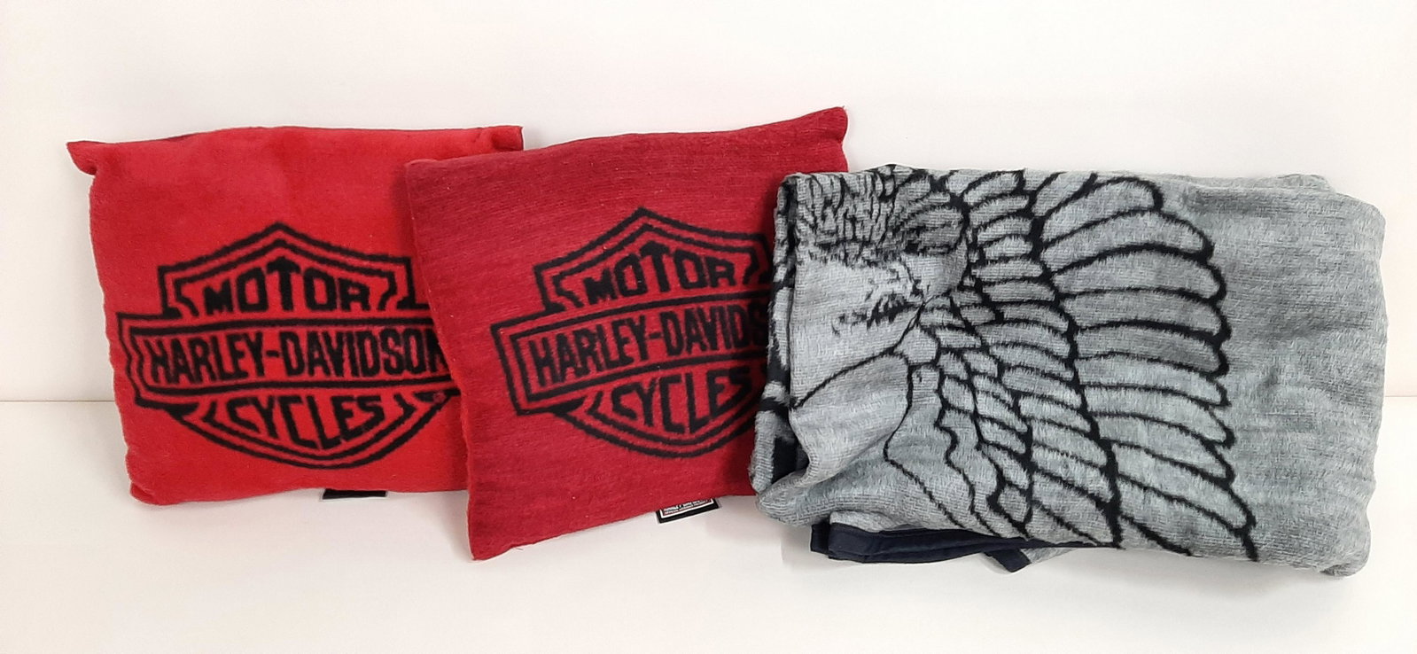 Harley-Davidson Fleece Blanket and 2 Pillows: Blanket: 7'3" wide X 7'3" long. 17" wide X 16" high. IMPORTANT: Before bidding, please read the terms and conditions. When you registered for the auction you agreed to these terms and will be required