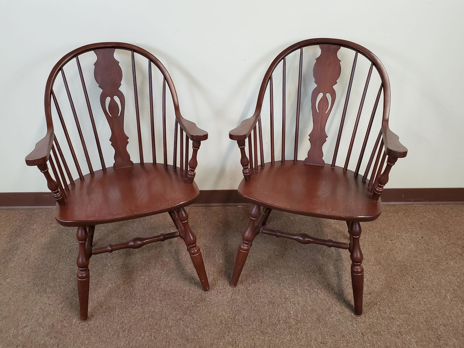 2 Bow Back Windsor Chairs By F.W. Lombard Co.: 23 1/2" wide X 17 1/4" deep X 35" high. Both chairs have water damage to clear coat. IMPORTANT: Before bidding, please read the terms and conditions. When you registered for the auction you agreed to