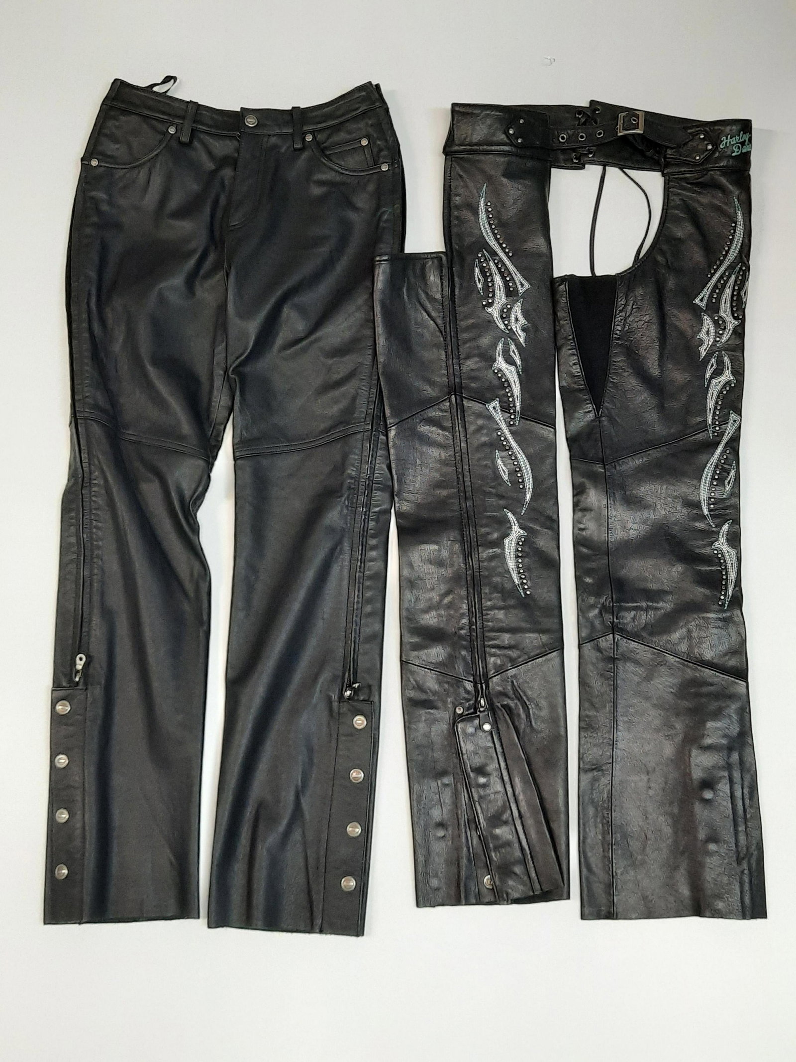 Women's Harley Davidson Pants and Chaps: Pants size 34/6 and chaps are size small. Some wear. IMPORTANT: Before bidding, please read the terms and conditions. When you registered for the auction you agreed to these terms and will be required