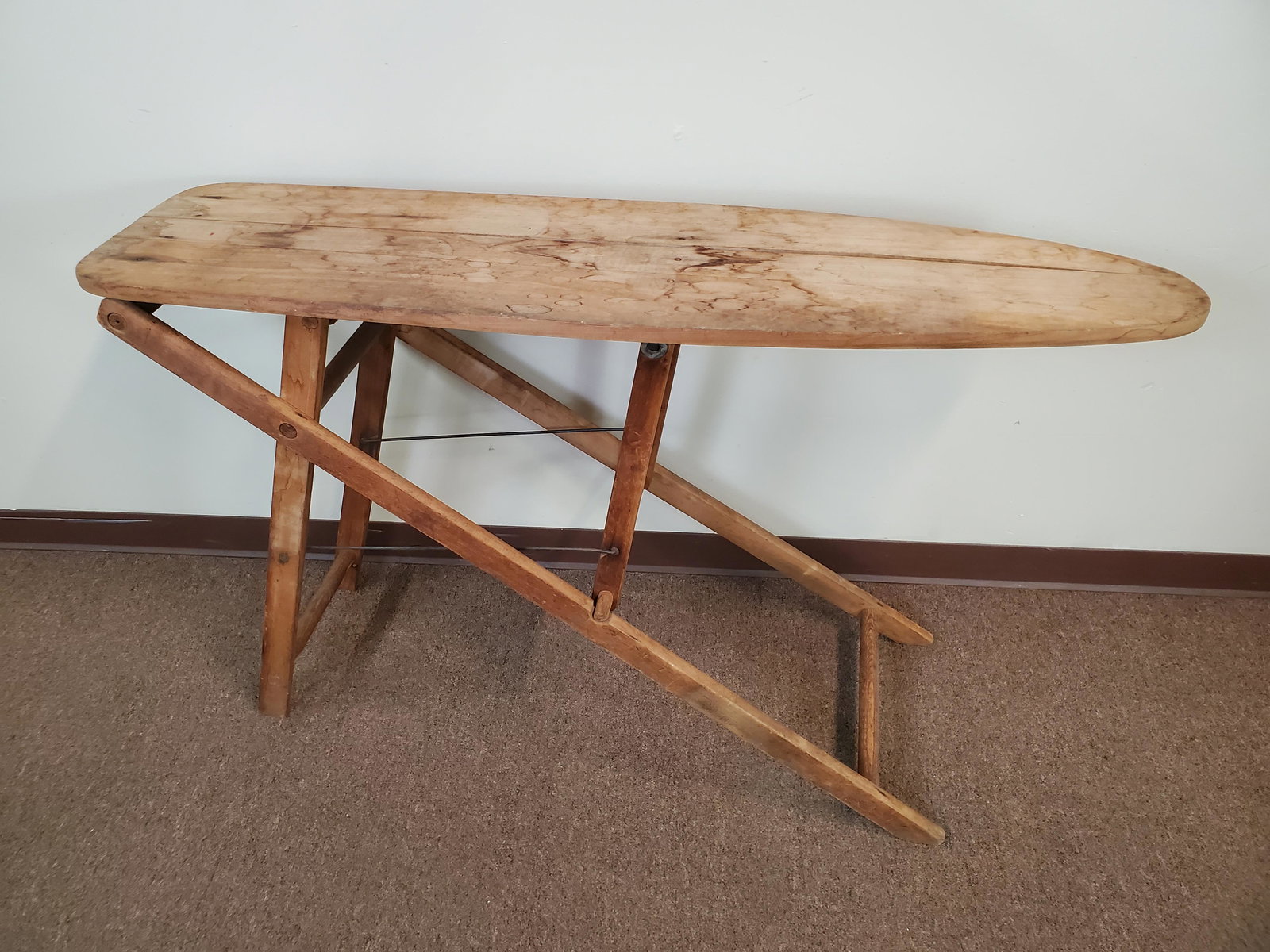 Antique Ironing Board: 54" wide X 13 1/2" deep X 32" high. IMPORTANT: Before bidding, please read the terms and conditions. When you registered for the auction you agreed to these terms and will be required to comply with t