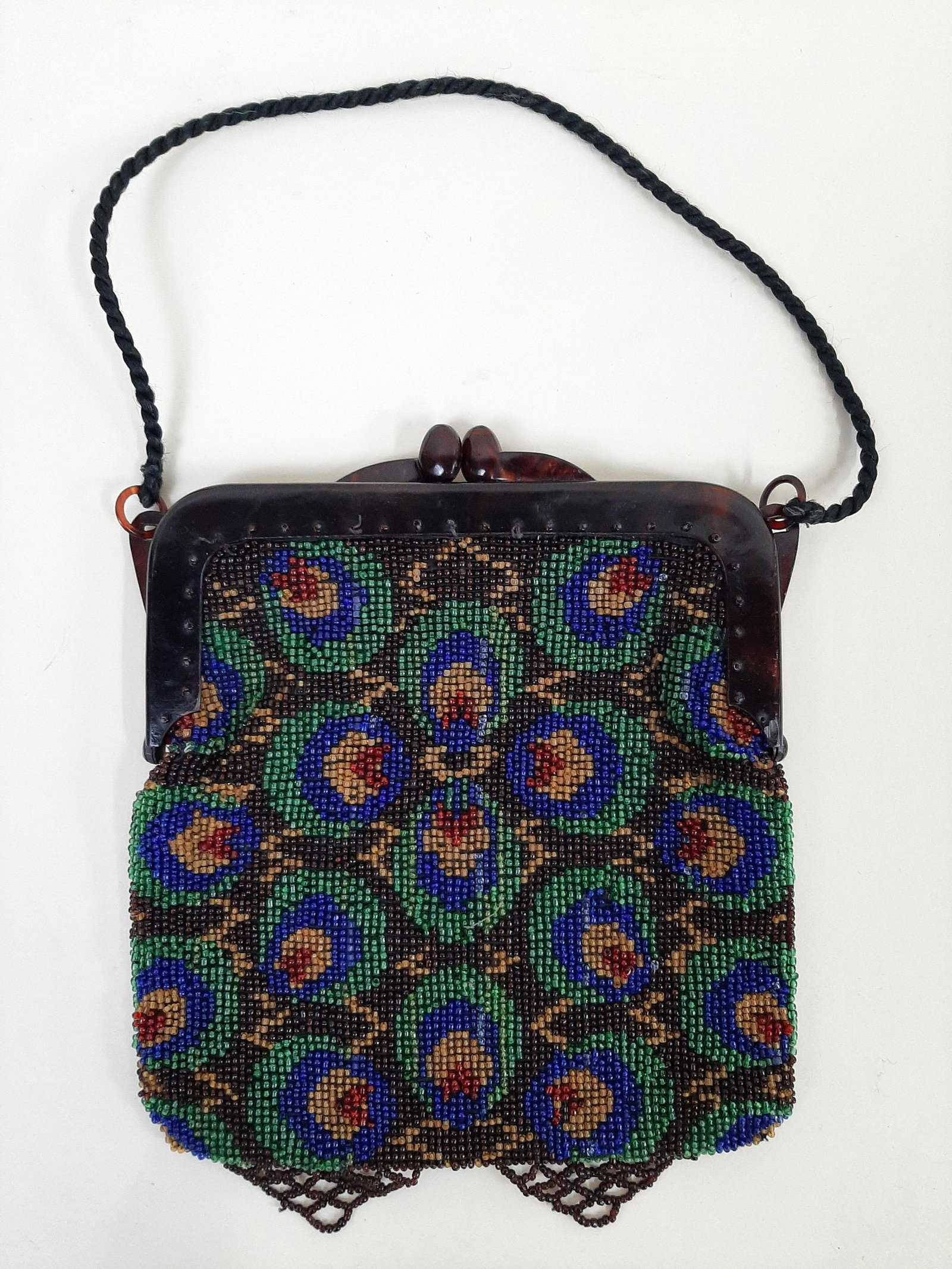 Vintage Beaded Purse: 6-1/2" wide X 8" high. Made in Germany. IMPORTANT: Before bidding, please read the terms and conditions. When you registered for the auction you agreed to these terms and will be required to comply wi