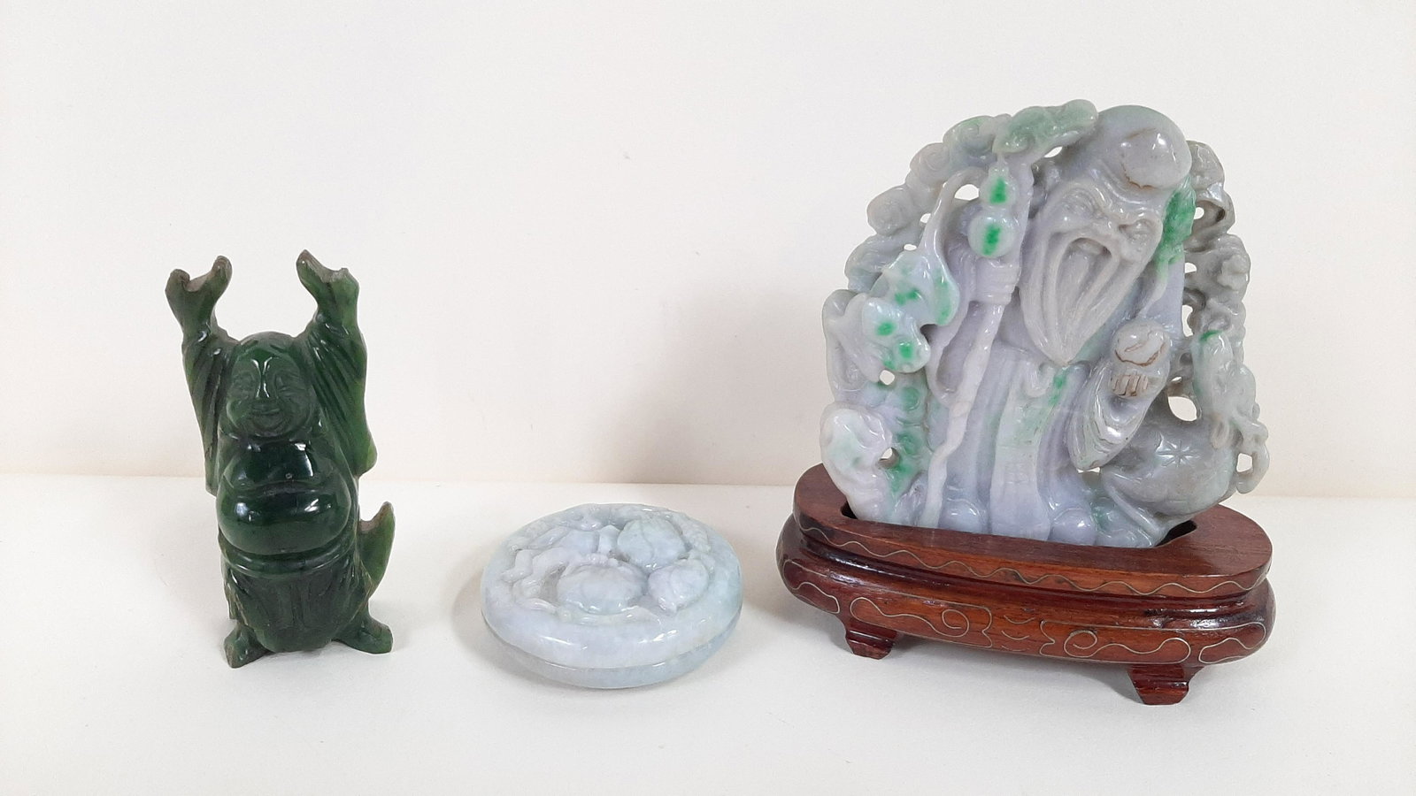 Jade Buddha, Sculpture and Dish: All pieces are jade. Figures: 3" to 4-1/4" high. Dish: 2" high. IMPORTANT: Before bidding, please read the terms and conditions. When you registered for the auction you agreed to these terms and will 