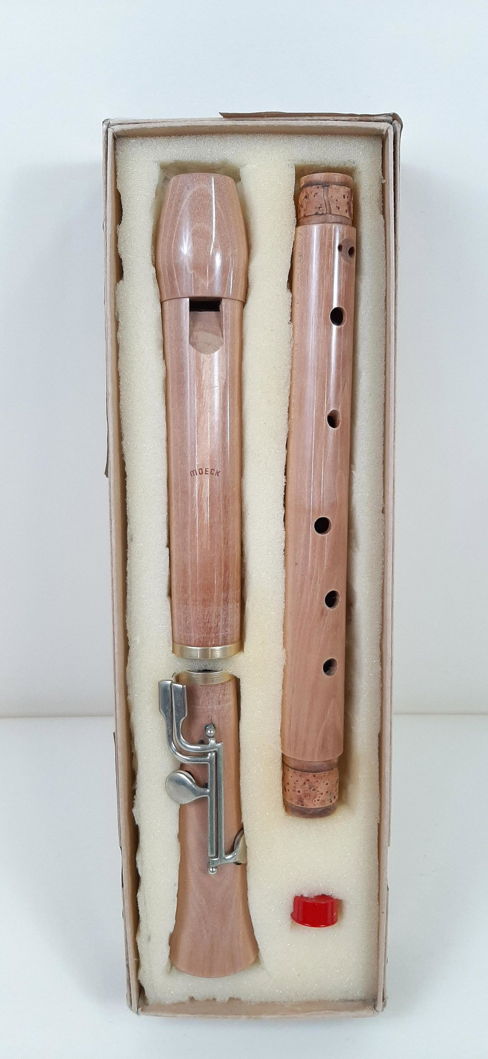 Moeck Recorder: 24-3/4" long. Maple #243. One split cork ring. IMPORTANT: Before bidding, please read the terms and conditions. When you registered for the auction you agreed to these terms and will be required to co