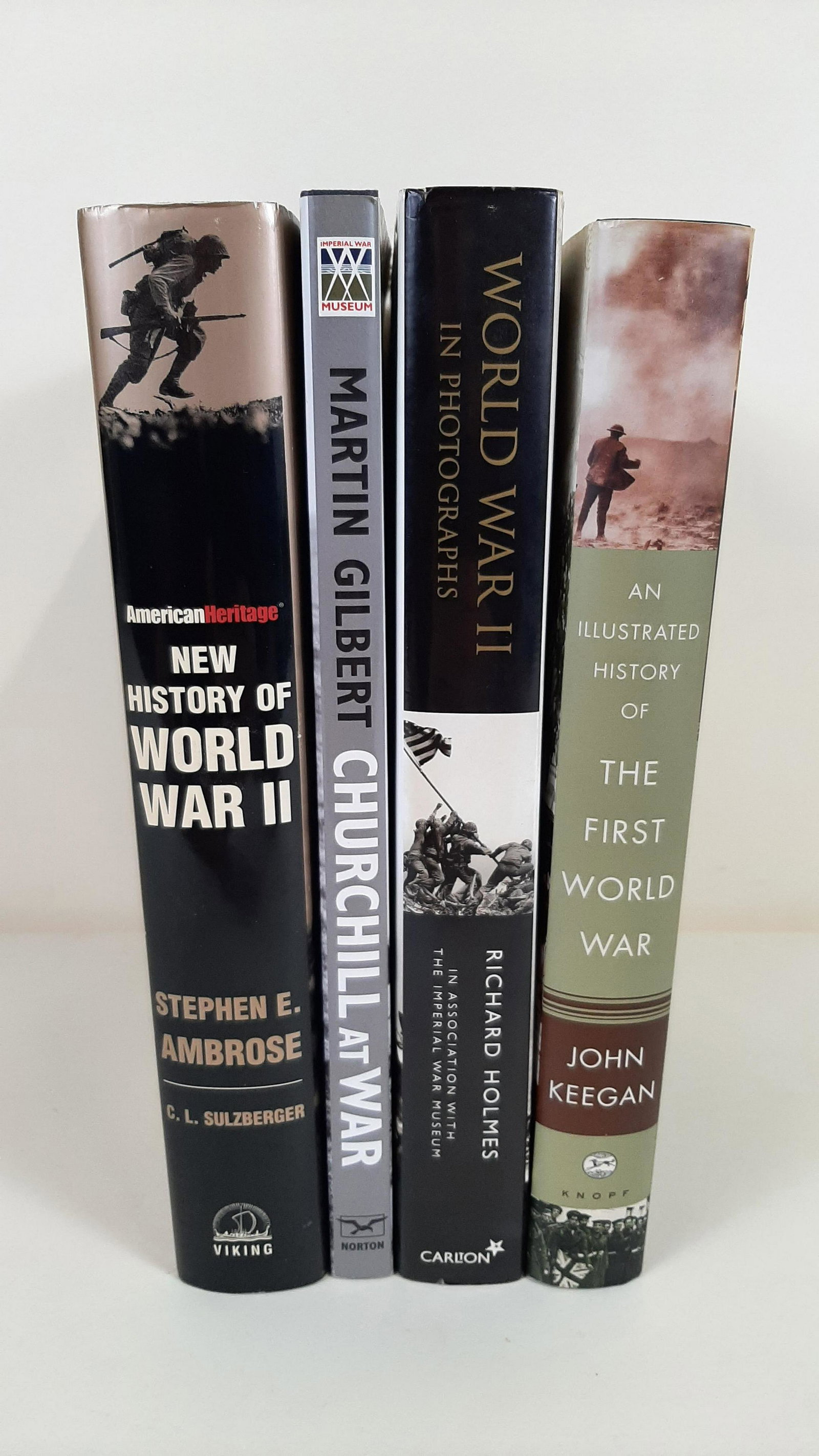 4 War Photography Books: Includes An Illustrated History of the First World War by John Keegan, World War II in Photographs by Richard Holmes, Churchill at War by Martin Gilbert, and the American Heritage New History of World