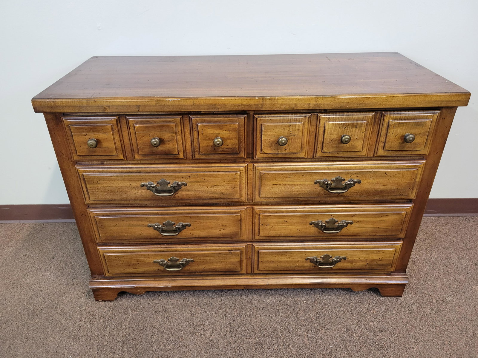 Thomasville Dresser: 44" wide X 19 1/2" deep X 30 1/2" high. Has some finish loss. IMPORTANT: Before bidding, please read the terms and conditions. When you registered for the auction you agreed to these terms and will be