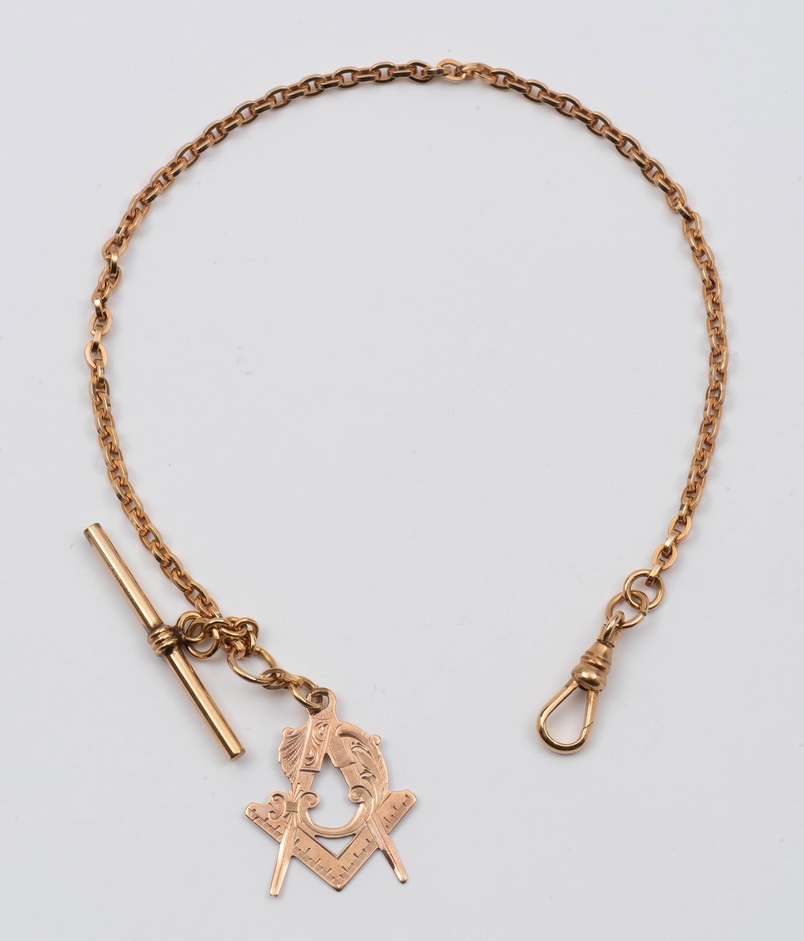 Victorian Gold Watch Chain with Masonic Fob: Both test gold. Chain 11" long. Fob 1" long. 7.2 dwt total. IMPORTANT: Before bidding, please read the terms and conditions. When you registered for the auction you agreed to these terms and will be r