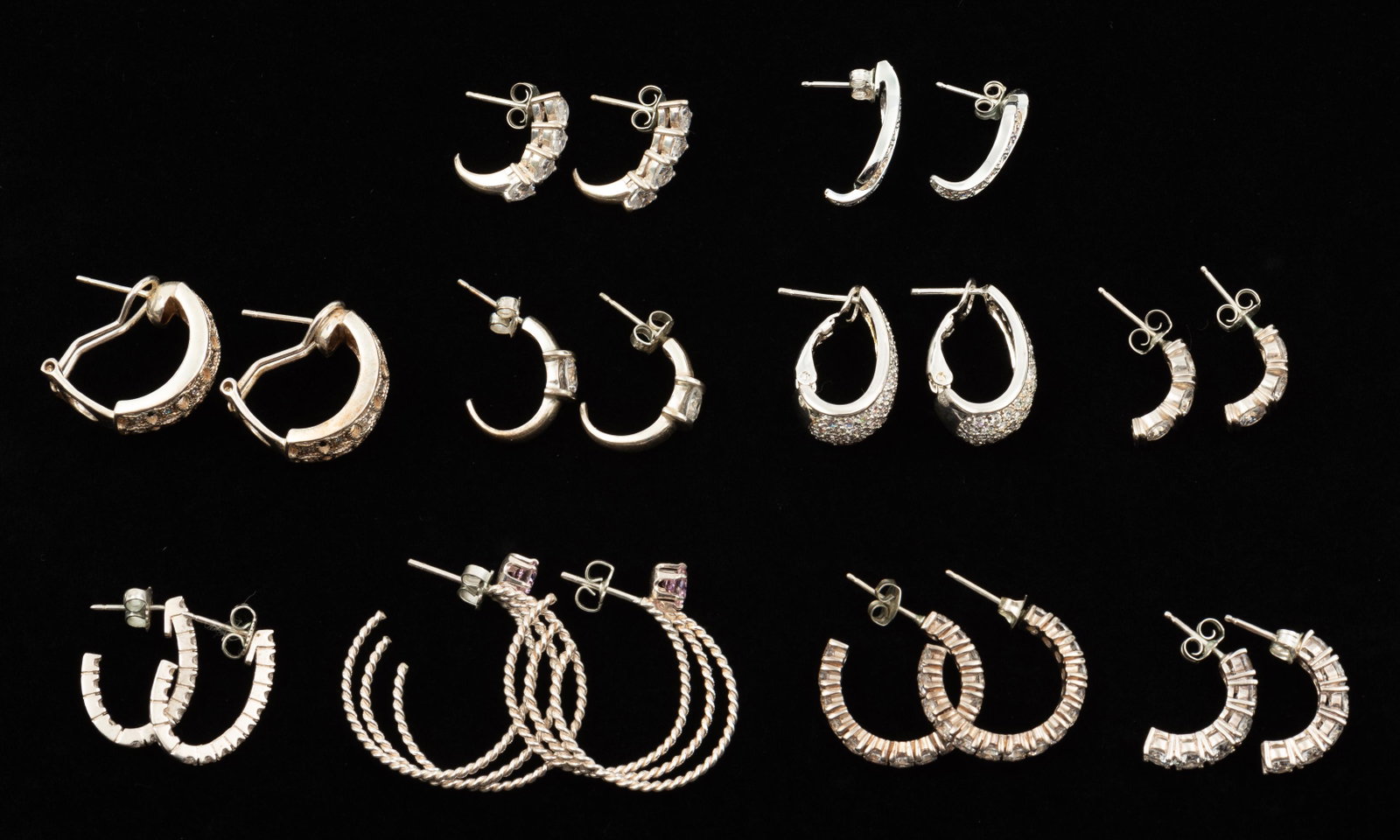 10 Pairs Sterling & CZ Earrings: Hoops with pink stones 1" long. IMPORTANT: Before bidding, please read the terms and conditions. When you registered for the auction you agreed to these terms and will be required to comply with them.