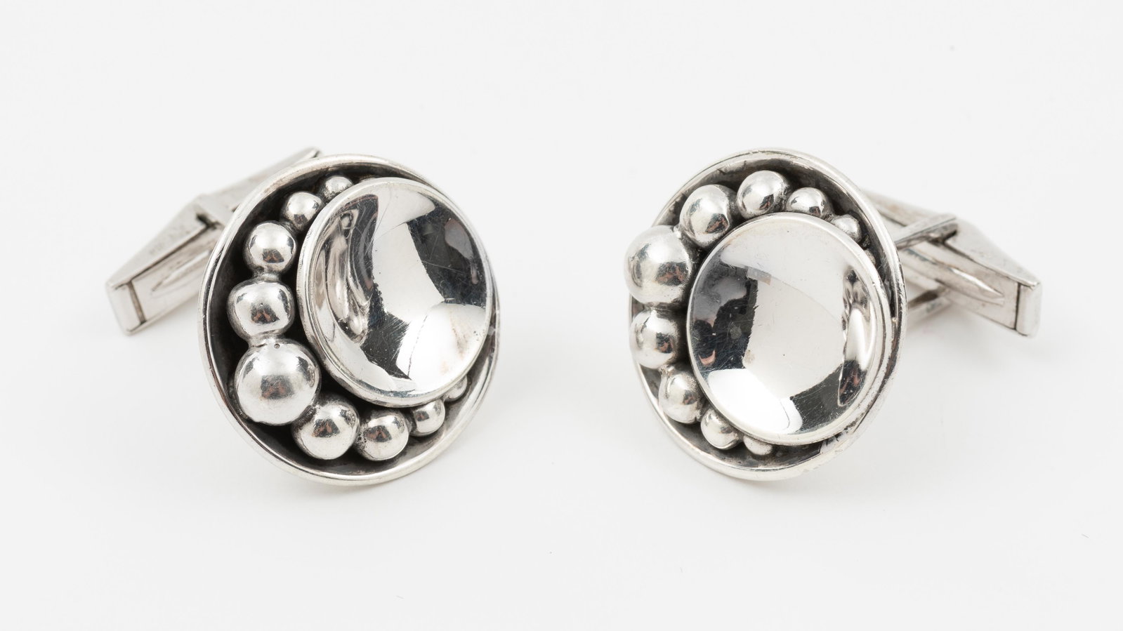 Kurt Christofferson for Int'l Sterling Cufflinks: 3/4" diameter. IMPORTANT: Before bidding, please read the terms and conditions. When you registered for the auction you agreed to these terms and will be required to comply with them.