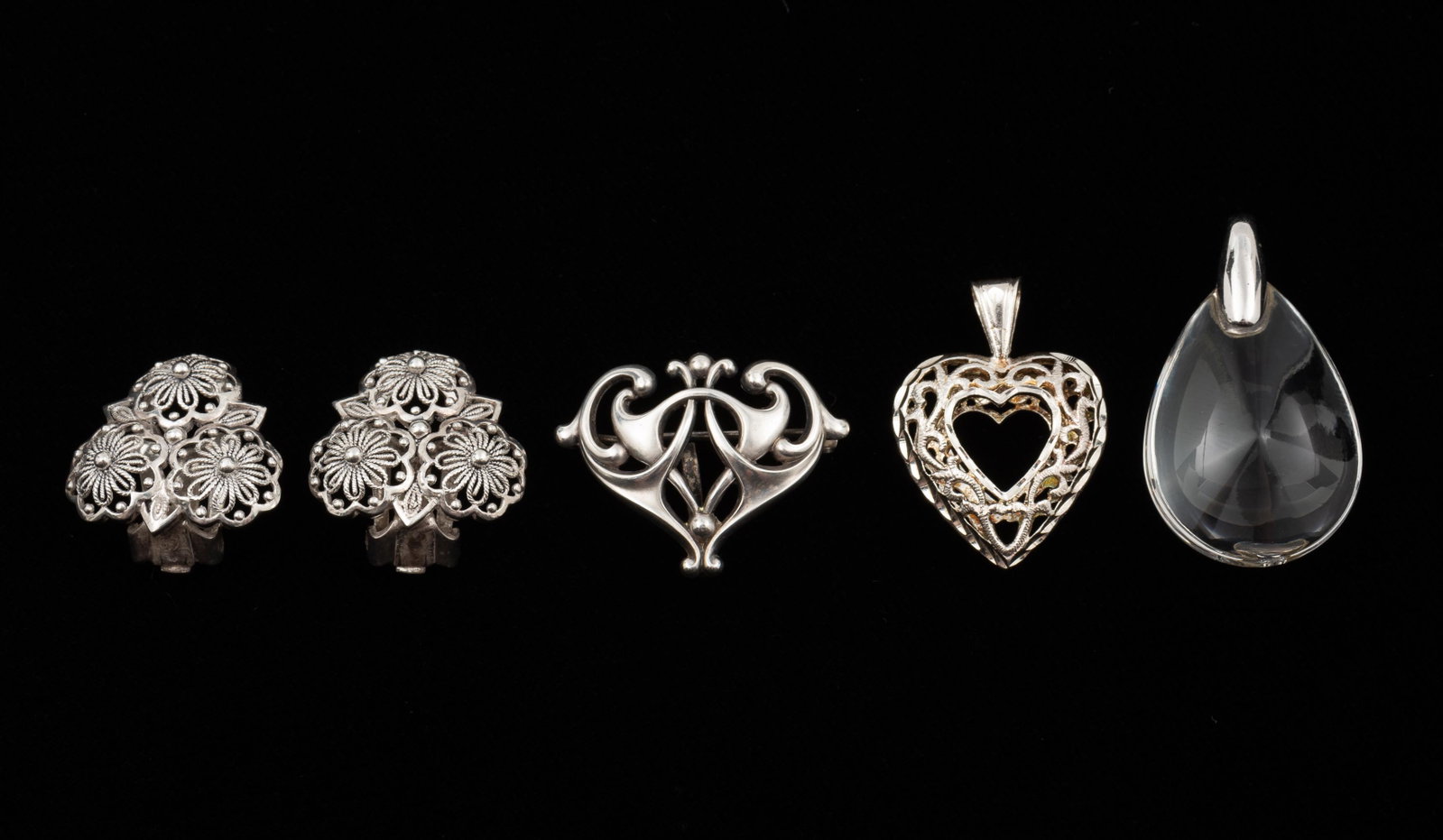 4 Pcs Sterling Jewelry: Danish pendant brooch 1" wide. Alice Caviness clip on earrings 3/4" long. IMPORTANT: Before bidding, please read the terms and conditions. When you registered for the auction you agreed to these terms