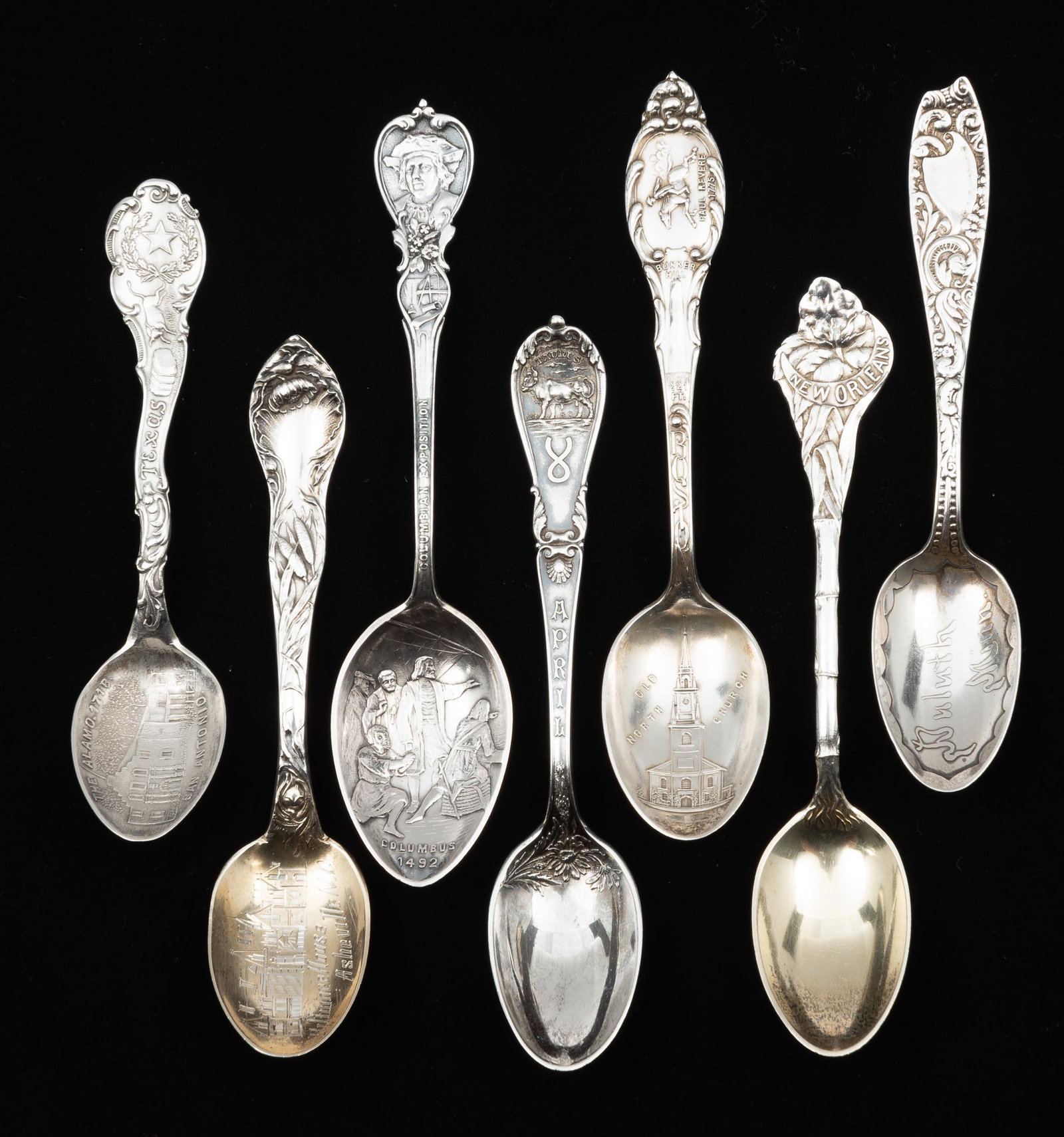 7 Sterling Demitasse Souvenir Spoons: Includes Duluth, Minnesota by Wallace, New Orleans by A.B. Griswold & Co. San Antonio, Texas, Boston by Alvin Manufacturing Co. Columbia Exposition by Tilden, Thurber, & Co., Biltmore House, Ashville,