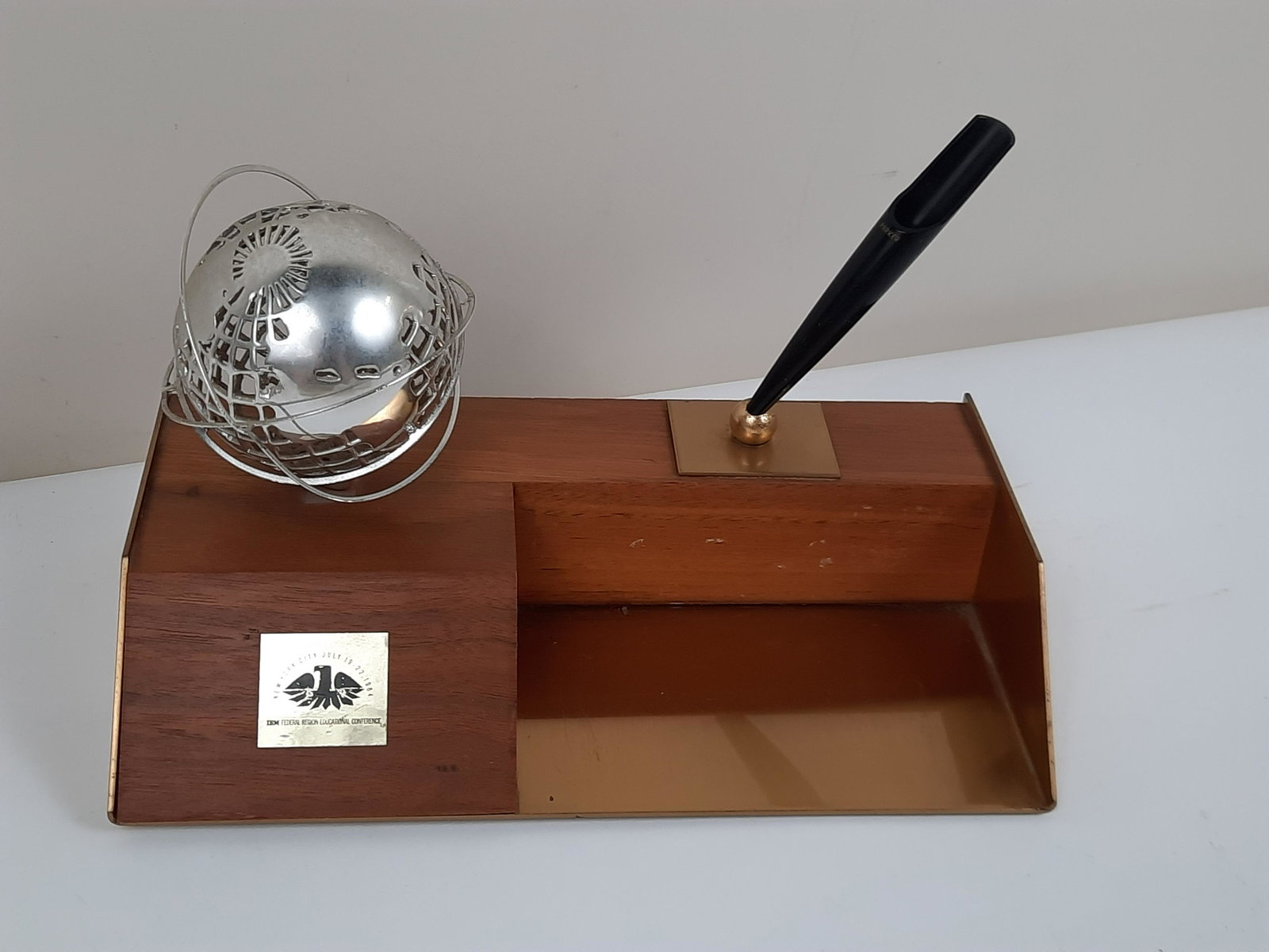 1961 World's Fair Parker Pen Holder: 8-1/2" wide x 5" deep x 5-1/2" high. IMPORTANT: Before bidding, please read the terms and conditions. When you registered for the auction you agreed to these terms and will be required to comply with 