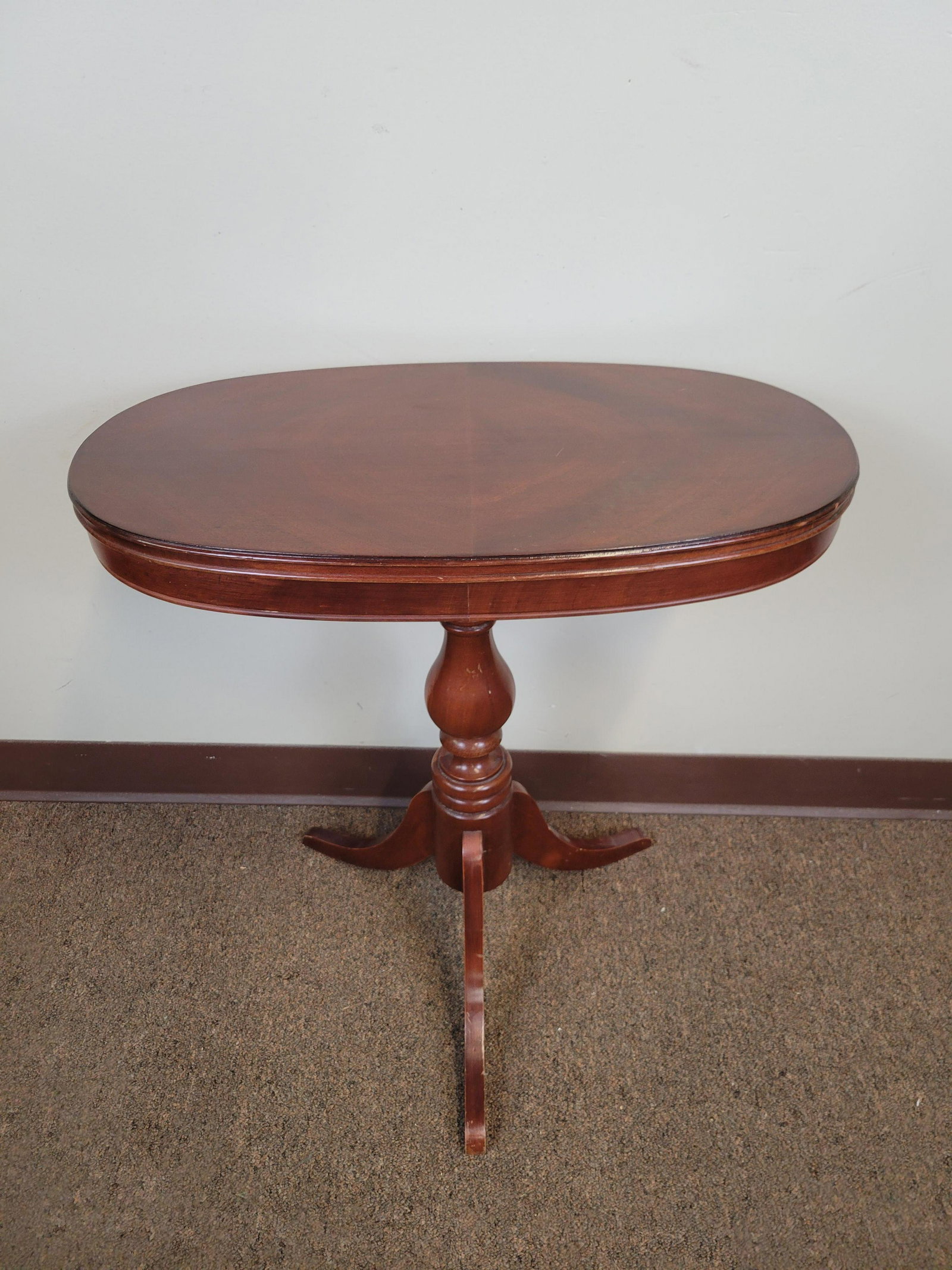 Oval Side Table: 23" wide X 12" deep X 24 1/2" high. IMPORTANT: Before bidding, please read the terms and conditions. When you registered for the auction you agreed to these terms and will be required to comply with t