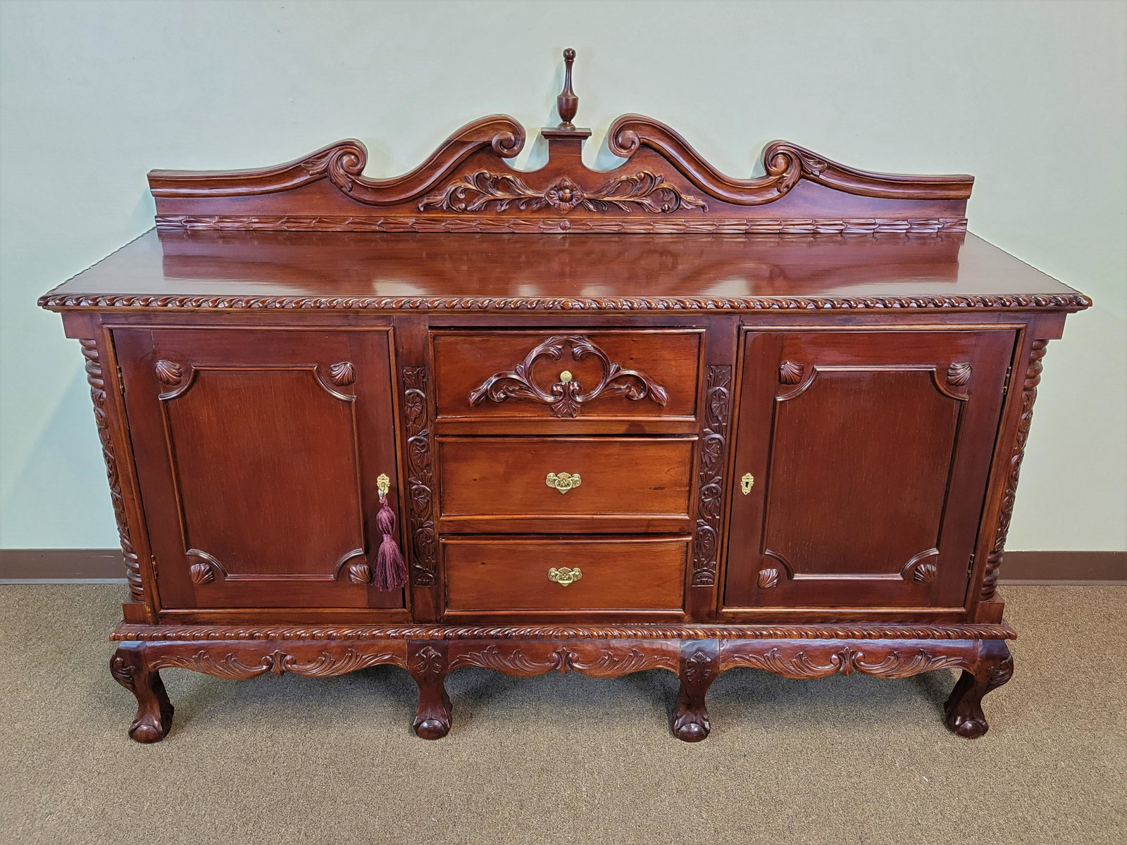 Carved Rococo Style Sideboard: 71" wide X 21 1/4" deep X 38" high. Crown has repair. IMPORTANT: Before bidding, please read the terms and conditions. When you registered for the auction you agreed to these terms and will be require