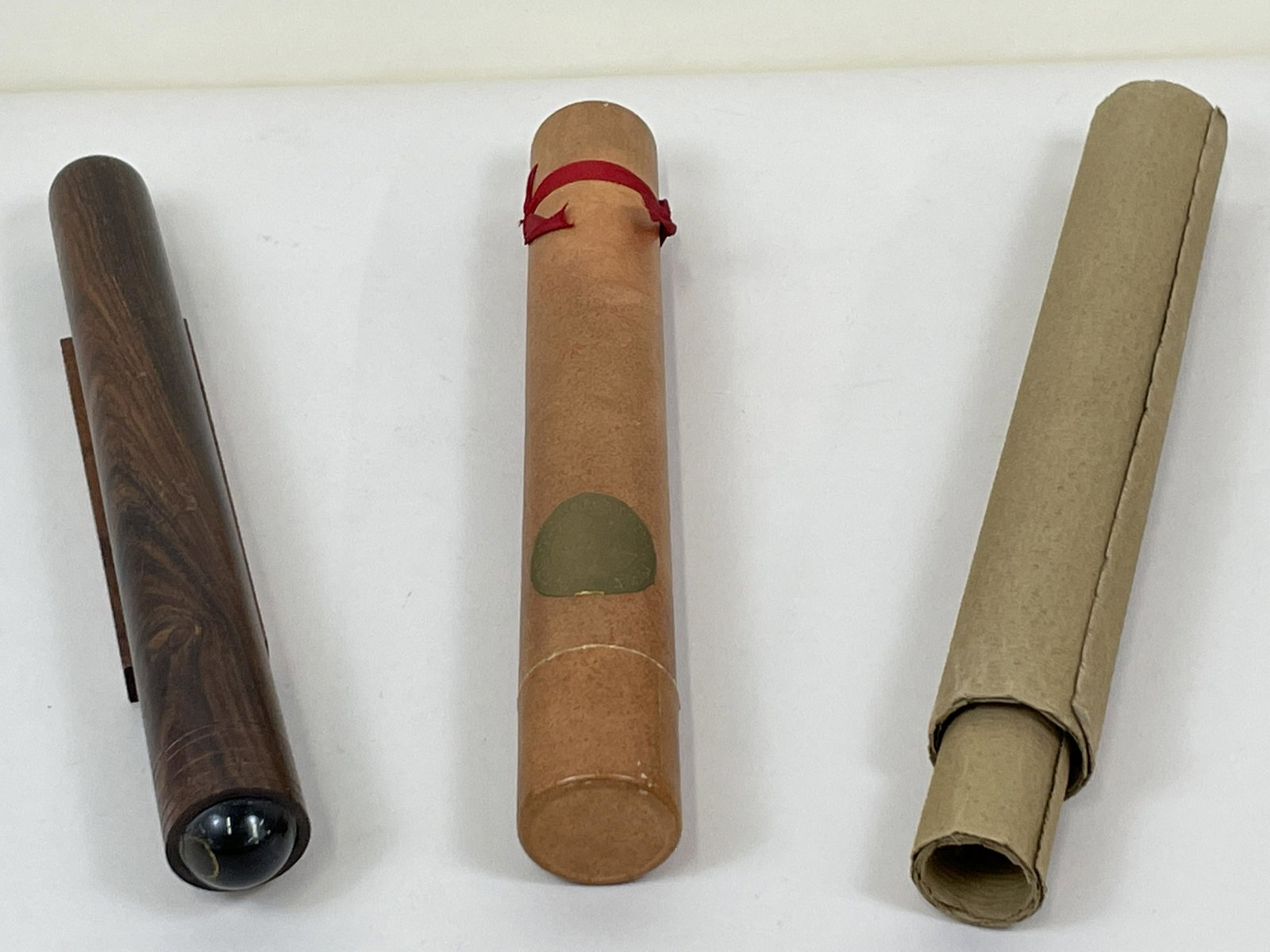 Bristol Palace Scroll in Holder and Kaleidoscope: 1" to 1 1/2" diameter x 10" to 10 1/2" long. IMPORTANT: Before bidding, please read the terms and conditions. When you registered for the auction you agreed to these terms and will be required to comp