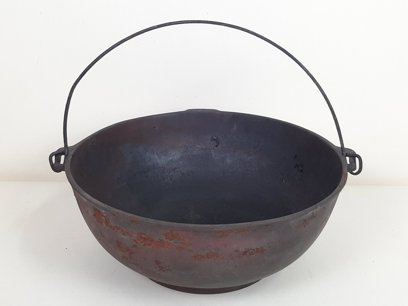 Erie Cast Iron Scotch Bowl: 13-1/2" wide X 5" high. IMPORTANT: Before bidding, please read the terms and conditions. When you registered for the auction you agreed to these terms and will be required to comply with them.