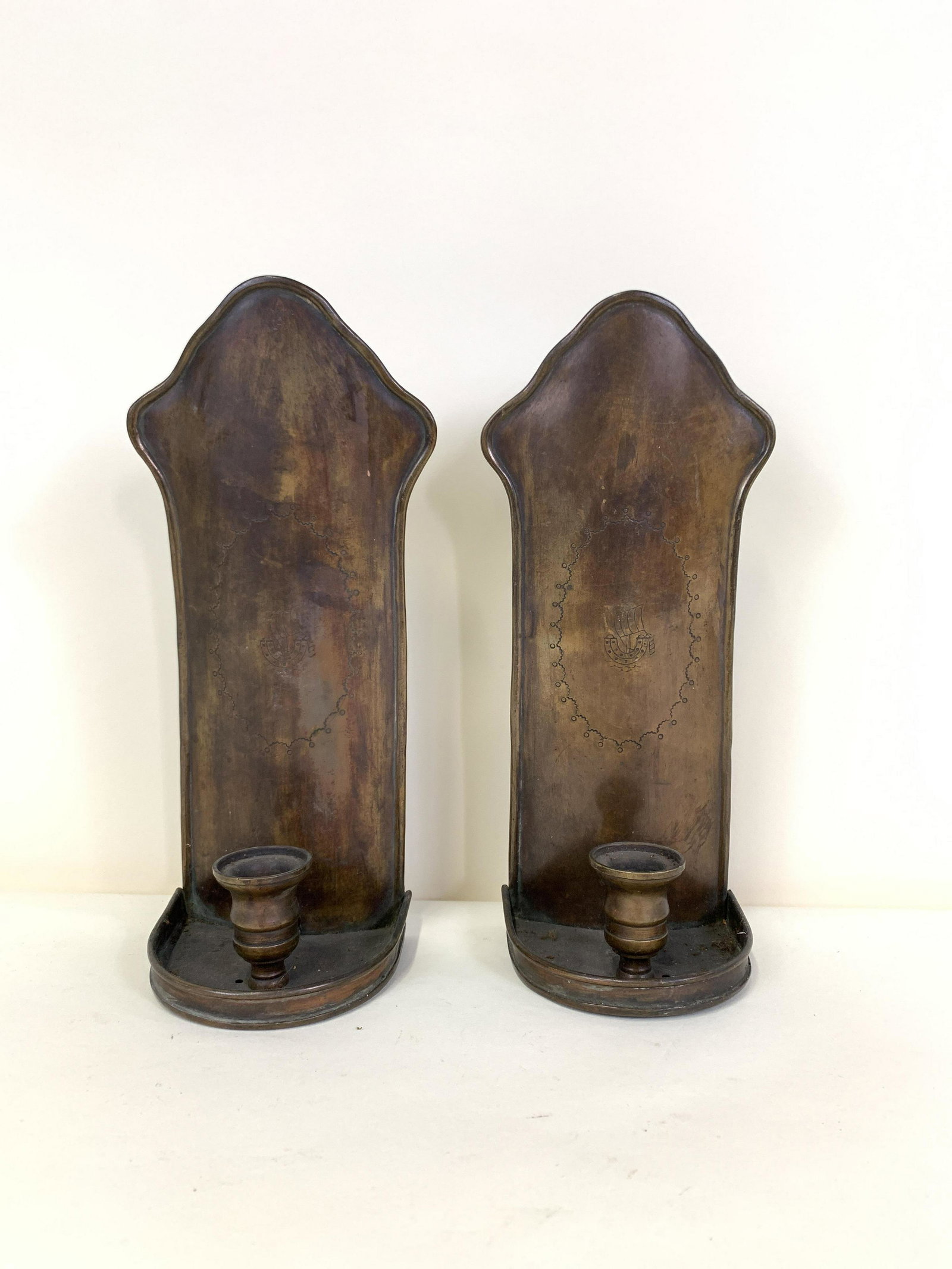 Pair of Handmade Wall Candle Sconces: 11-1/4” long x 5” at widest point. IMPORTANT: Before bidding, please read the terms and conditions. When you registered for the auction you agreed to these terms and will be required to comply wit