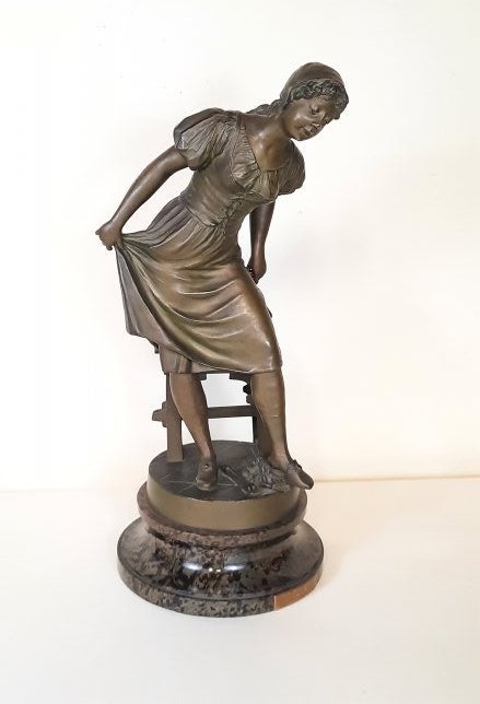 "Cendrillon" Sculpture: Bronze finish spelter on marble base. 7-1/2" wide x 9" deep x 21" high. IMPORTANT: Before bidding, please read the terms and conditions. When you registered for the auction you agreed to these terms a
