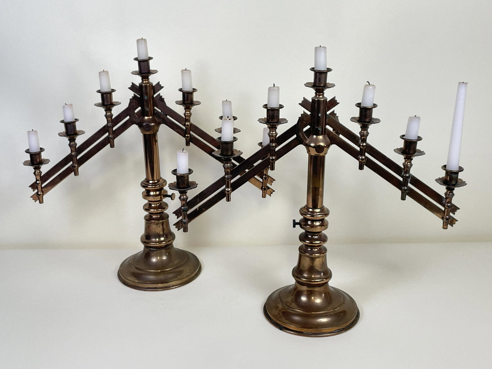 Pair Flexible Candelabra: 21 wide x 19 high. Some oxidation. IMPORTANT: Before bidding, please read the terms and conditions. When you registered for the auction you agreed to these terms and will be required to comply with th