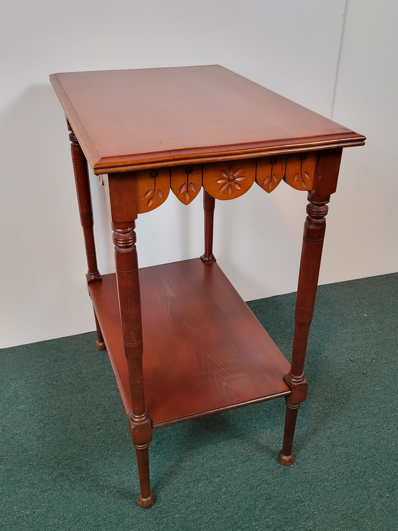 Carved Side Table: 16" wide X 24" deep X 29 1/2" high. IMPORTANT: Before bidding, please read the terms and conditions. When you registered for the auction you agreed to these terms and will be required to comply with t