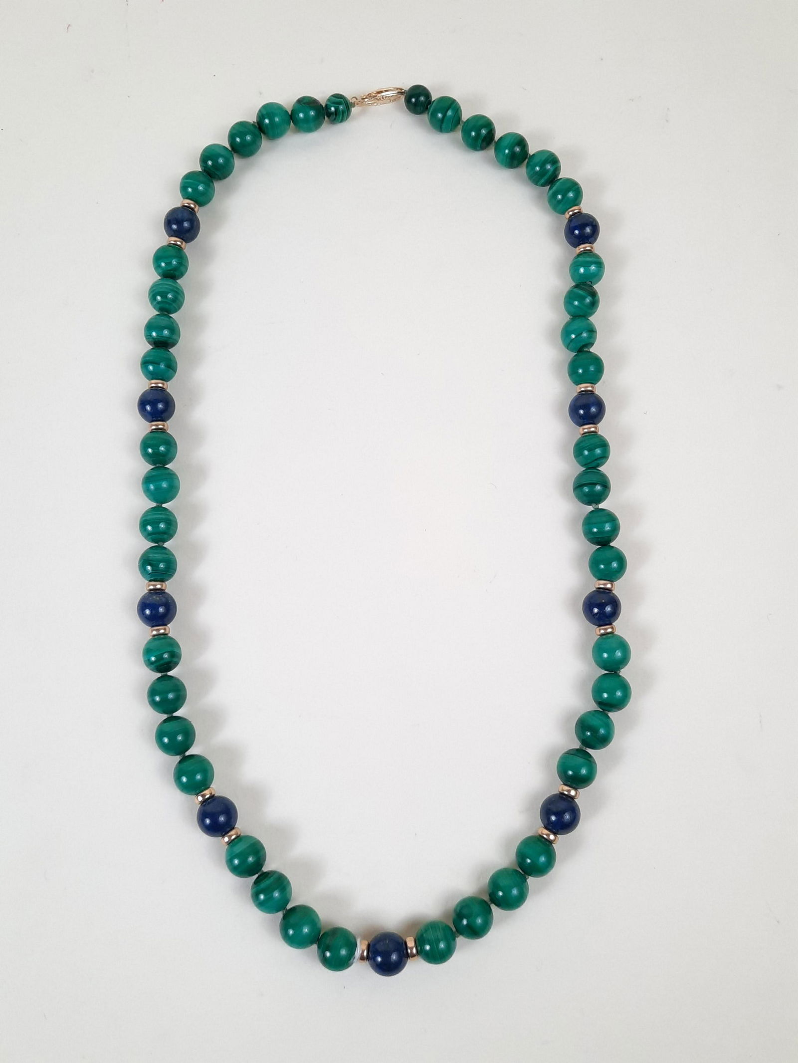Malachite and Lapis Bead Necklace w/ 14K Clasp: 22" long. IMPORTANT: Before bidding, please read the terms and conditions. When you registered for the auction you agreed to these terms and will be required to comply with them.