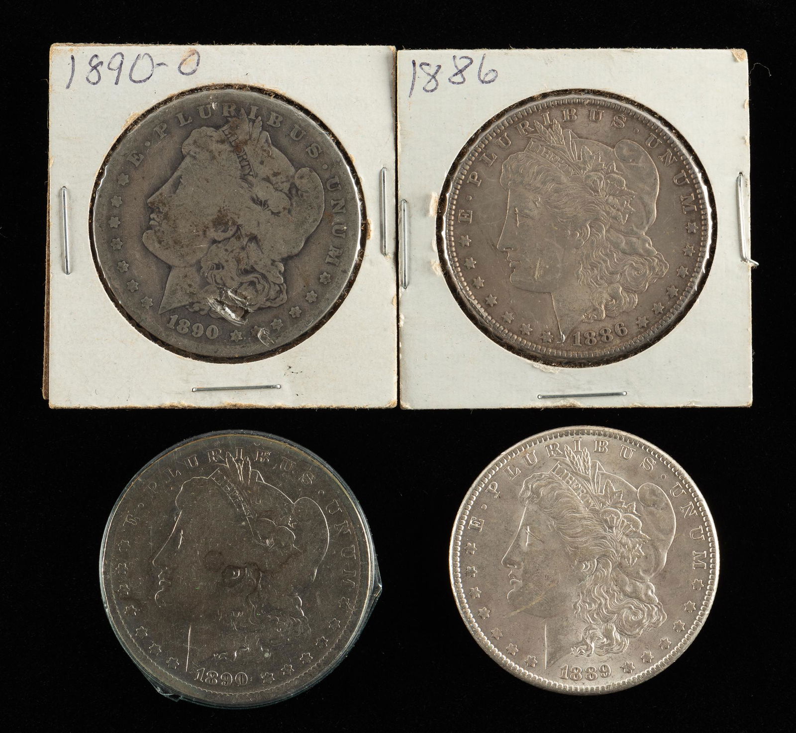 4 Morgan Silver Dollars Incl 1886 (1 of 2)
