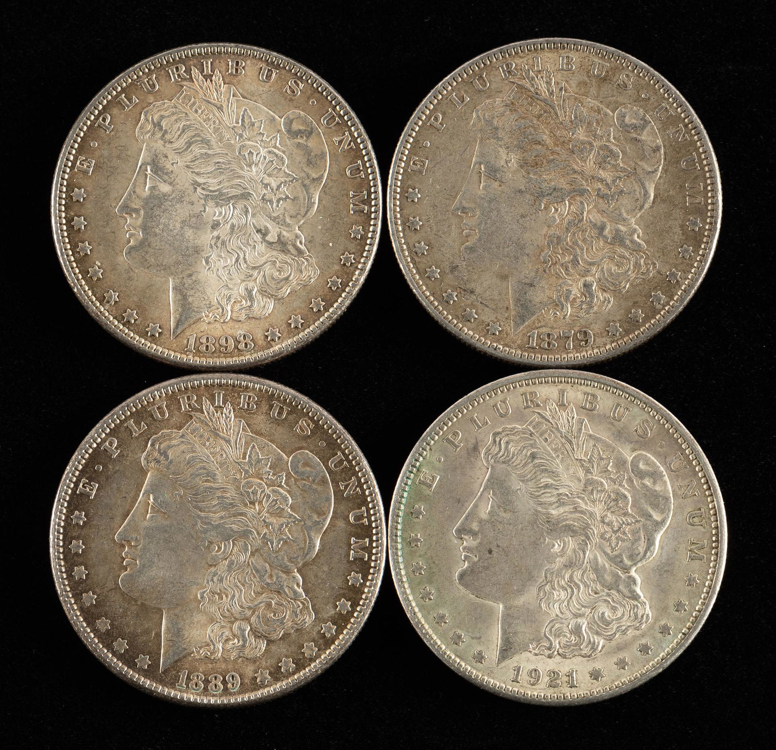 4 Morgan Silver Dollars Incl 1879 (1 of 2)