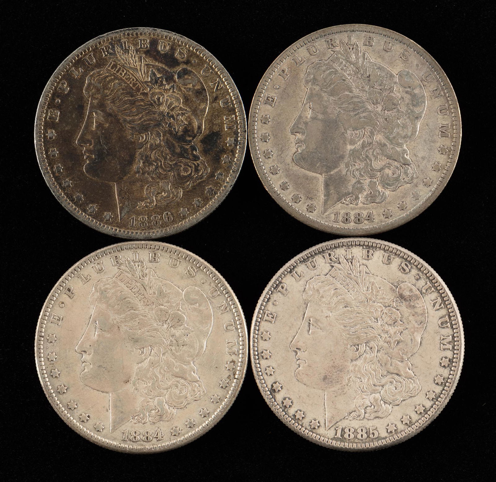 4 Morgan Silver Dollars Incl 1884 P & O (1 of 2)