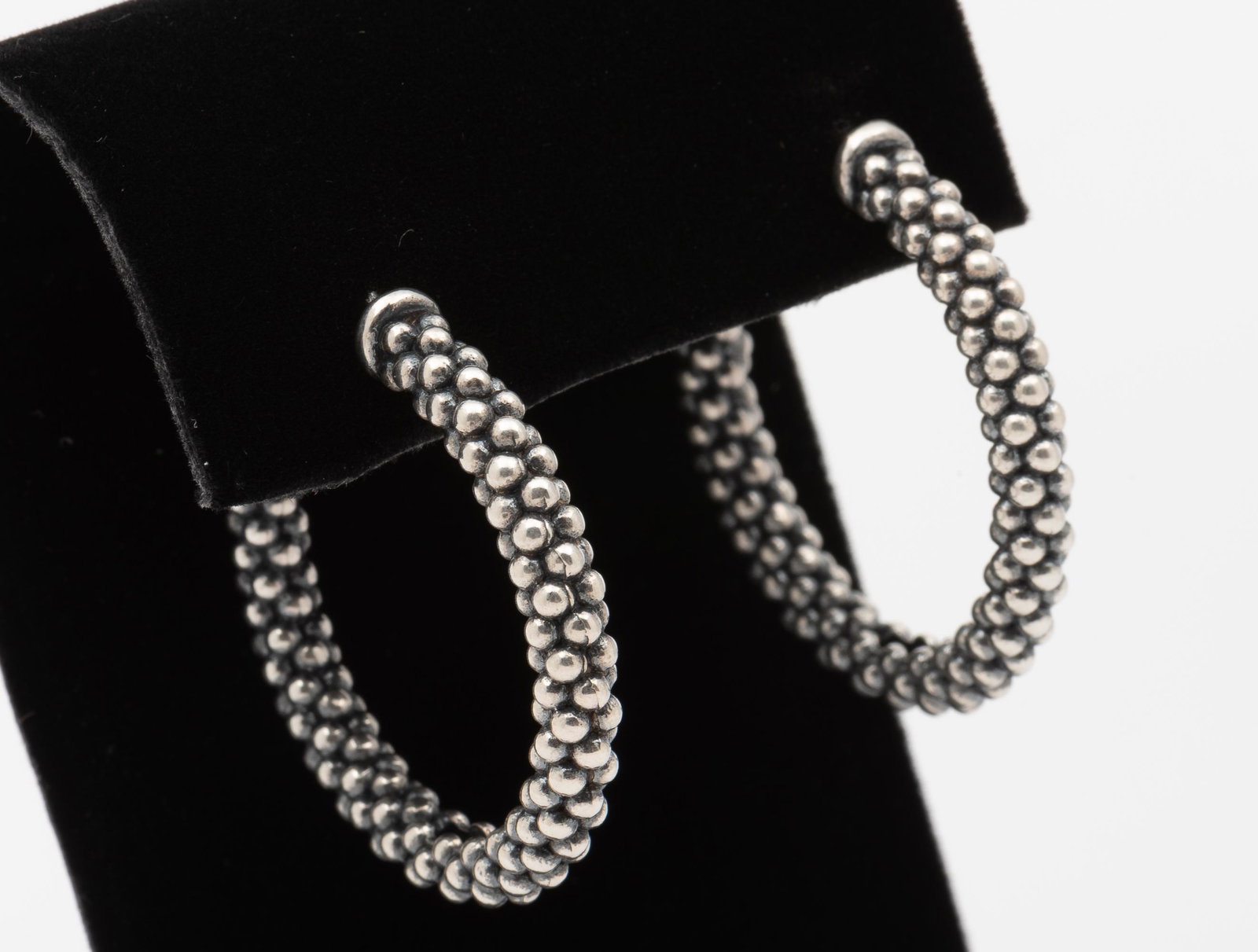 Caviar Sterling Hoop Earrings: 1-1/4" long. IMPORTANT: Before bidding, please read the terms and conditions. When you registered for the auction you agreed to these terms and will be required to comply with them.