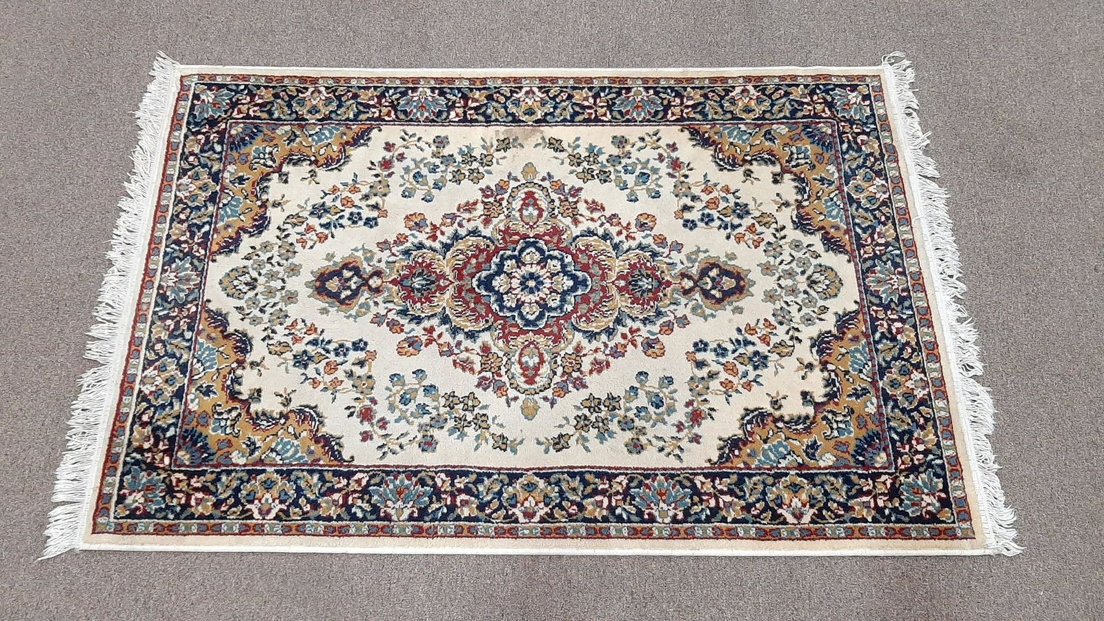 Marrasheen Classic Area Rug: 3'9" wide X 5'10" long. IMPORTANT: Before bidding, please read the terms and conditions. When you registered for the auction you agreed to these terms and will be required to comply with them.
