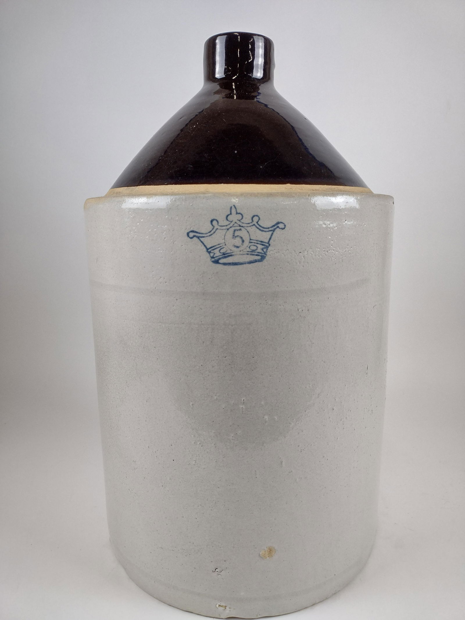 Robert Ransbottom 5 Gallon Jug: 11" diameter x 19" high. IMPORTANT: Before bidding, please read the terms and conditions. When you registered for the auction you agreed to these terms and will be required to comply with them.