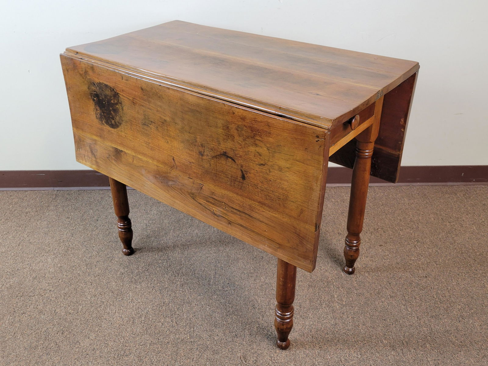 Drop Leaf Table: Open 48", closed 19" wide X 36 1/2" deep X 30 1/4" high. Top has some discoloring. IMPORTANT: Before bidding, please read the terms and conditions. When you registered for the auction you agreed to th