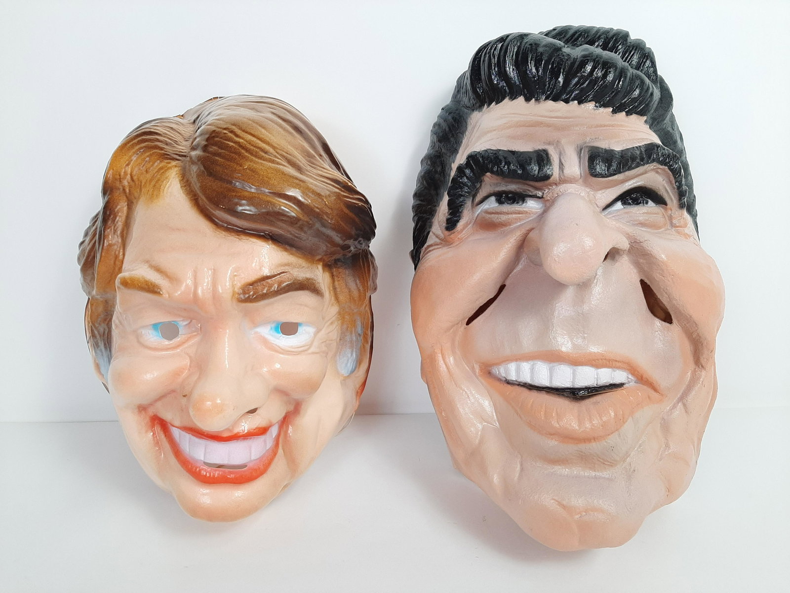 Vintage Ronald Reagan and Jimmy Carter Masks: 11" to 14" high. IMPORTANT: Before bidding, please read the terms and conditions. When you registered for the auction you agreed to these terms and will be required to comply with them.