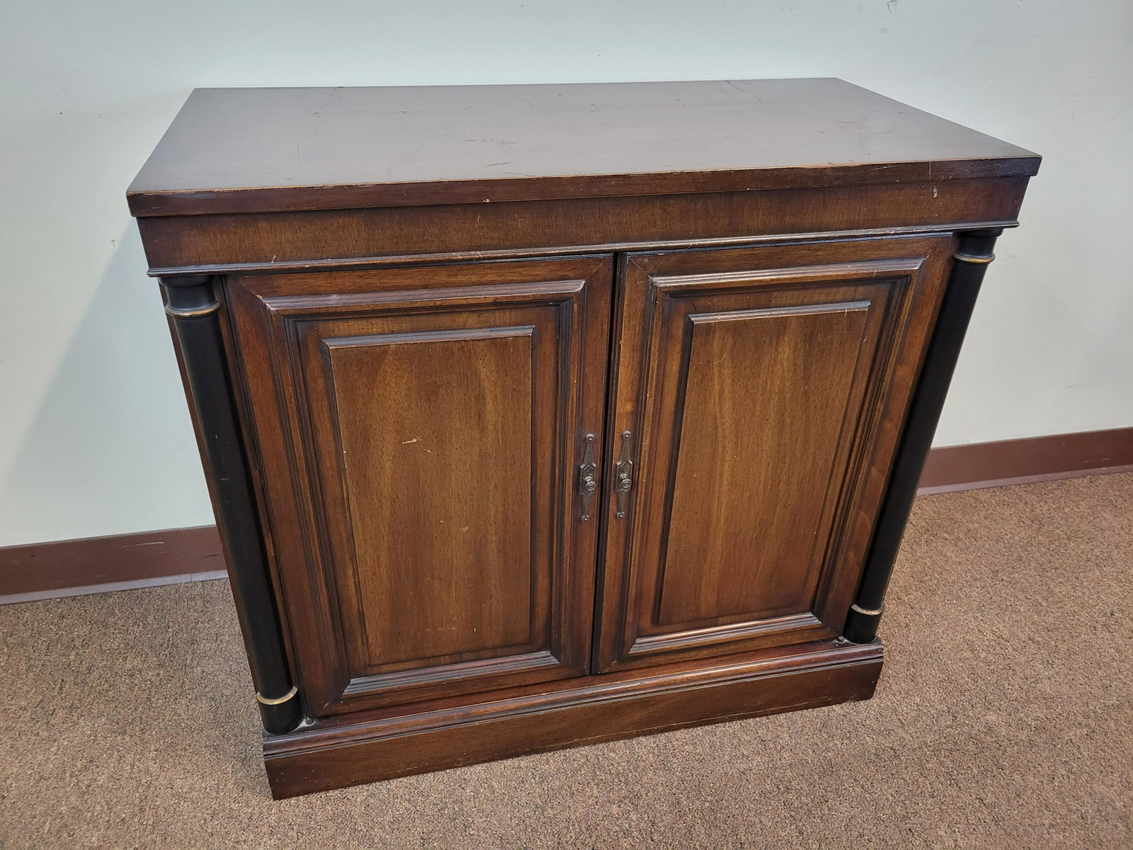 Brandt Low Cabinet: 32" wide X 16" deep X 29" high. Top has some scratches. IMPORTANT: Before bidding, please read the terms and conditions. When you registered for the auction you agreed to these terms and will be requi