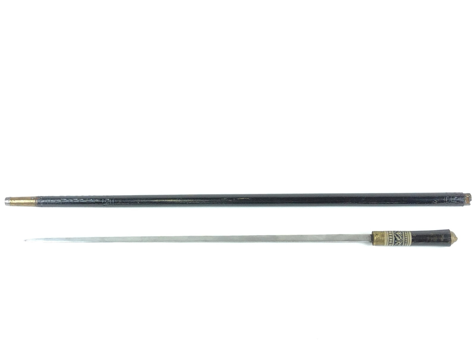 Antique Indian Sword Cane: With bone inlay. Sword 24-1/2" long. Overall 36-1/4" long. IMPORTANT: Before bidding, please read the terms and conditions. When you registered for the auction you agreed to these terms and will be re