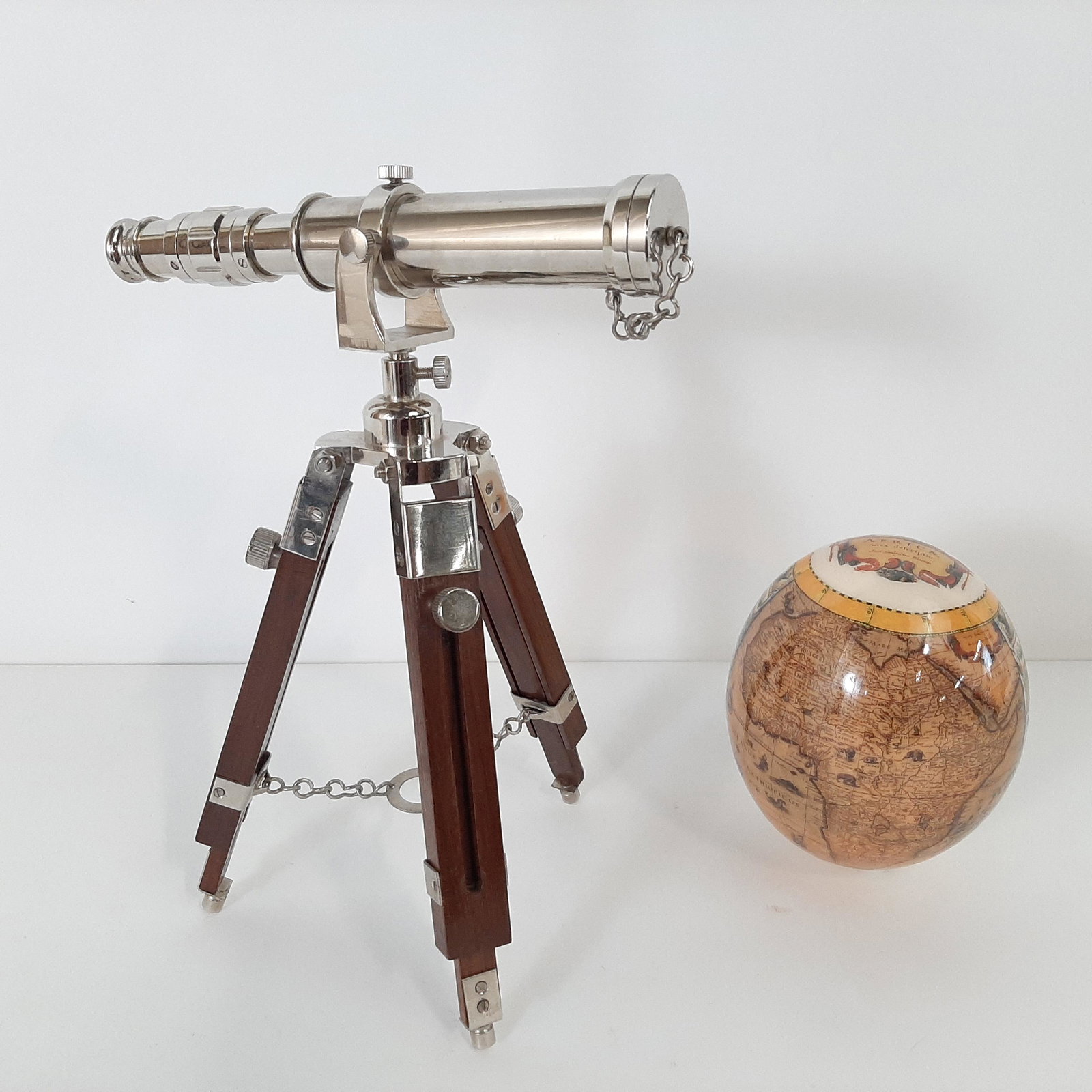 Miniature Telescope and Acrylic Map Egg: 6-1/2" to 12" high. IMPORTANT: Before bidding, please read the terms and conditions. When you registered for the auction you agreed to these terms and will be required to comply with them.