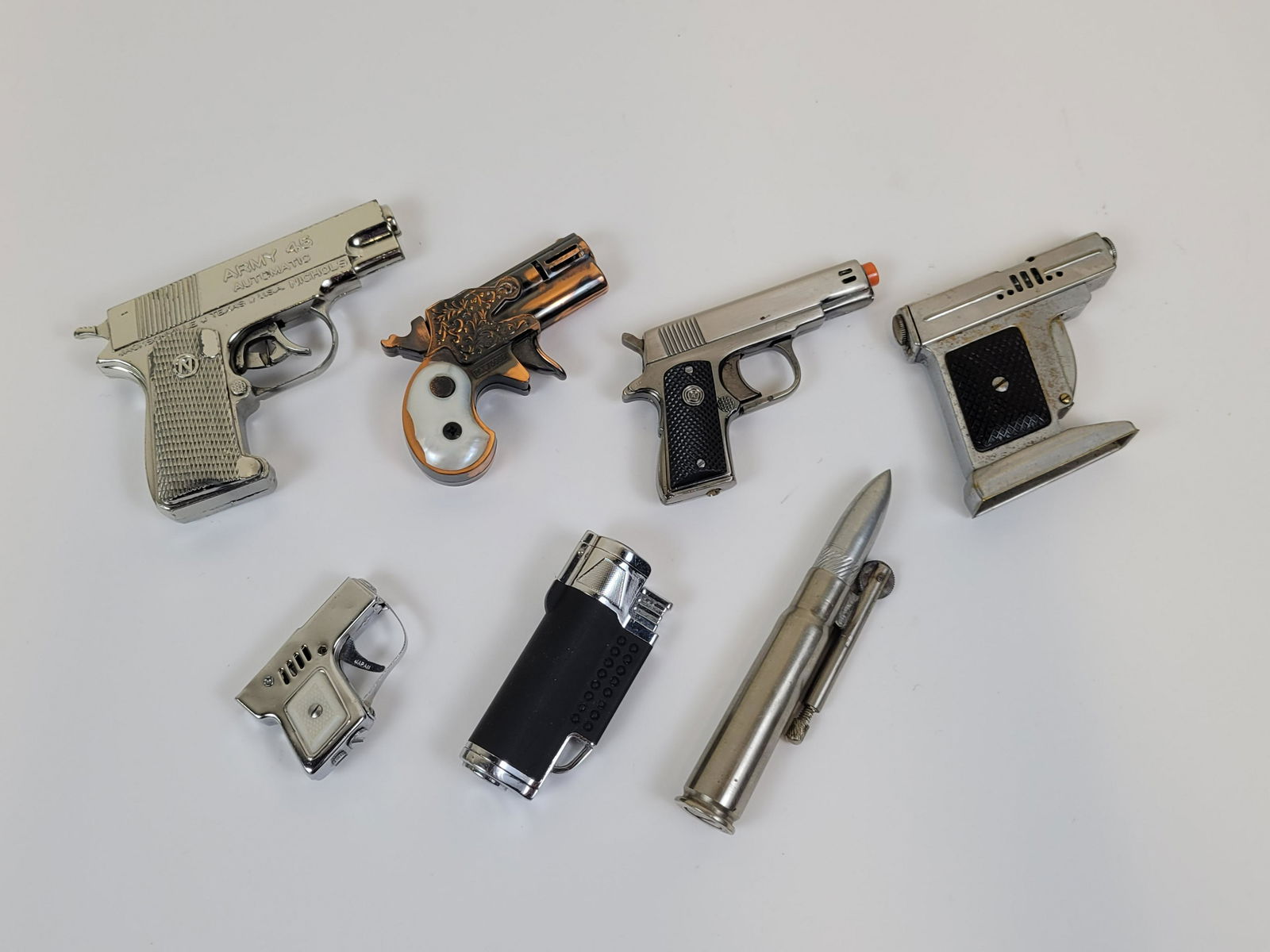 7 Novelty Lighters Incl Guns (1 of 2)