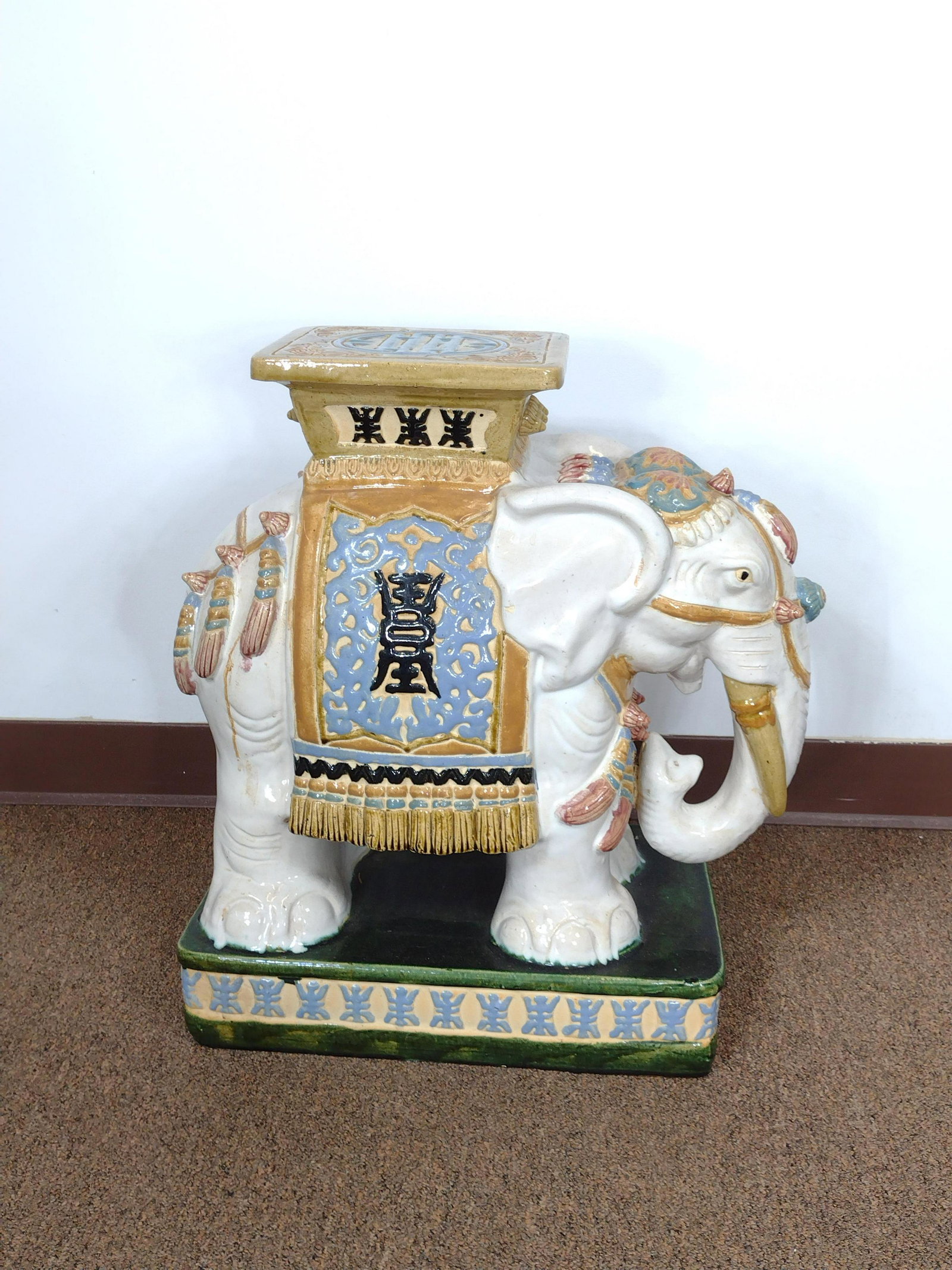 Elephant Garden Stand: 11" wide X 17 1/2" deep X 22 1/2" high. IMPORTANT: Before bidding, please read the terms and conditions. When you registered for the auction you agreed to these terms and will be required to comply wi
