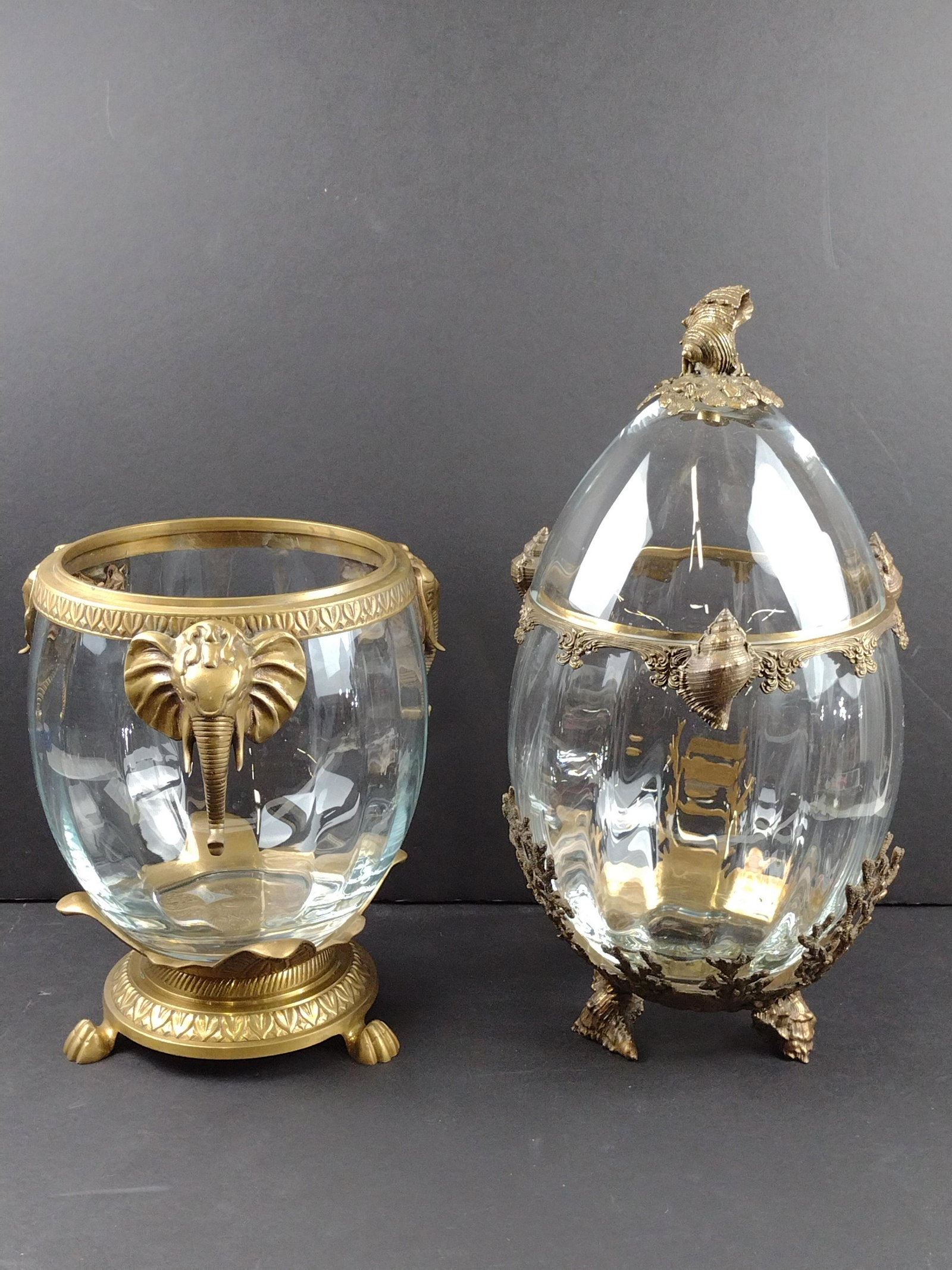 Two Castilian Imports Brass and Glass Items: Seashell lidded vase marked Castilian Imports Inc. Poland. Elephant bowl marked Castilian 9423 Made In India. 13" to 19" high overall. IMPORTANT: Before bidding, please read the terms and conditions. 