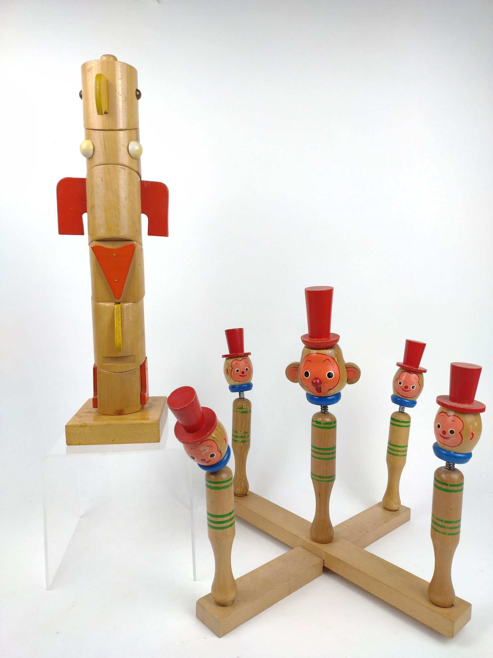 2 Wood Toys Inc Creative Playthings: Includes totem and ring toss game made in Japan. Totem 17-1/8" high. Ring toss 13" high x 13-1/4" wide. Some paint loss to faces on ring toss. IMPORTANT: Before bidding, please read the terms and cond