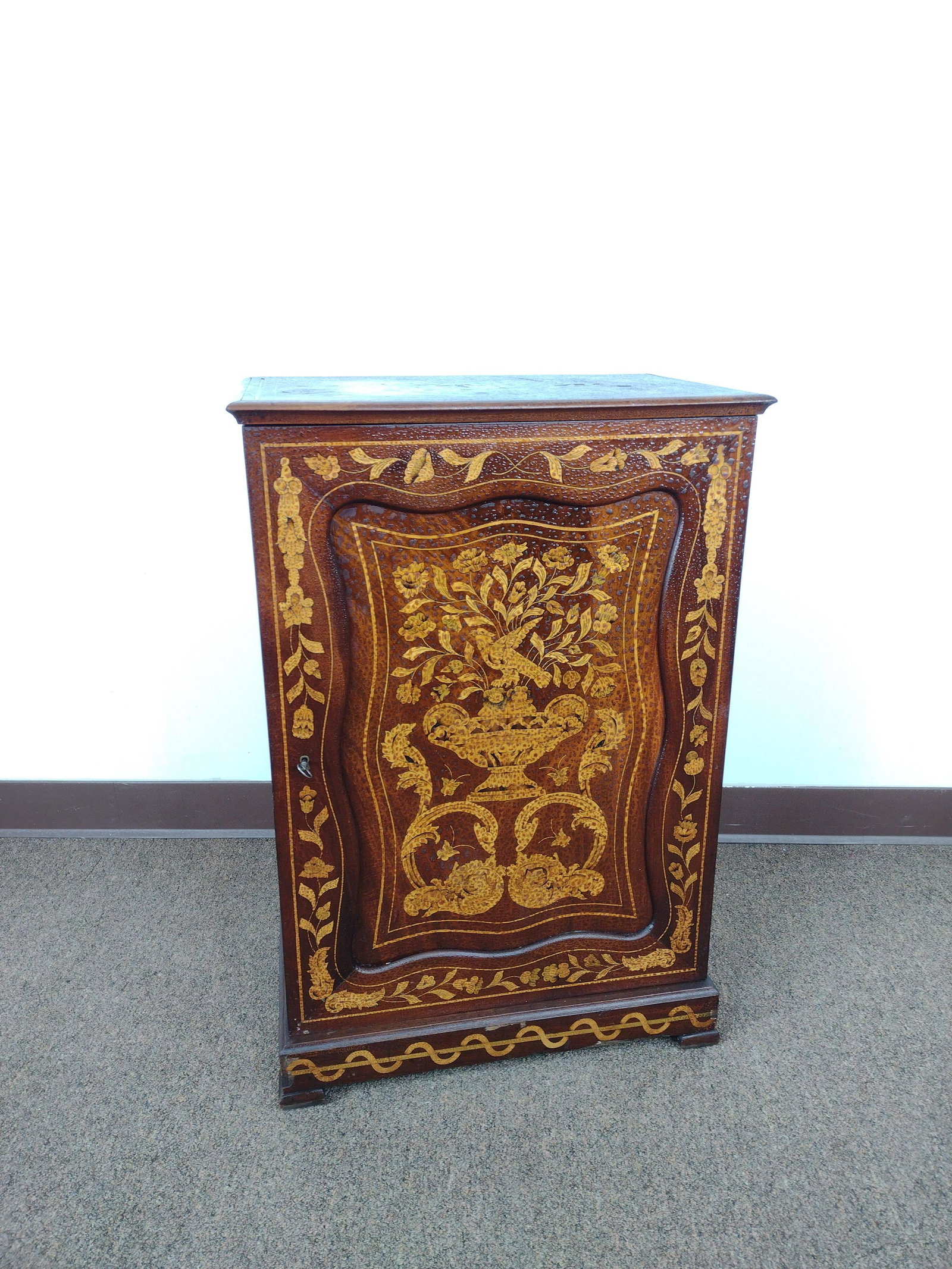 19th Century Inlaid Music Cabinet: 20" wide X 13" deep X 29 1/2" high. Has some loss to inlay and discoloration to top. IMPORTANT: Before bidding, please read the terms and conditions. When you registered for the auction you agreed to 