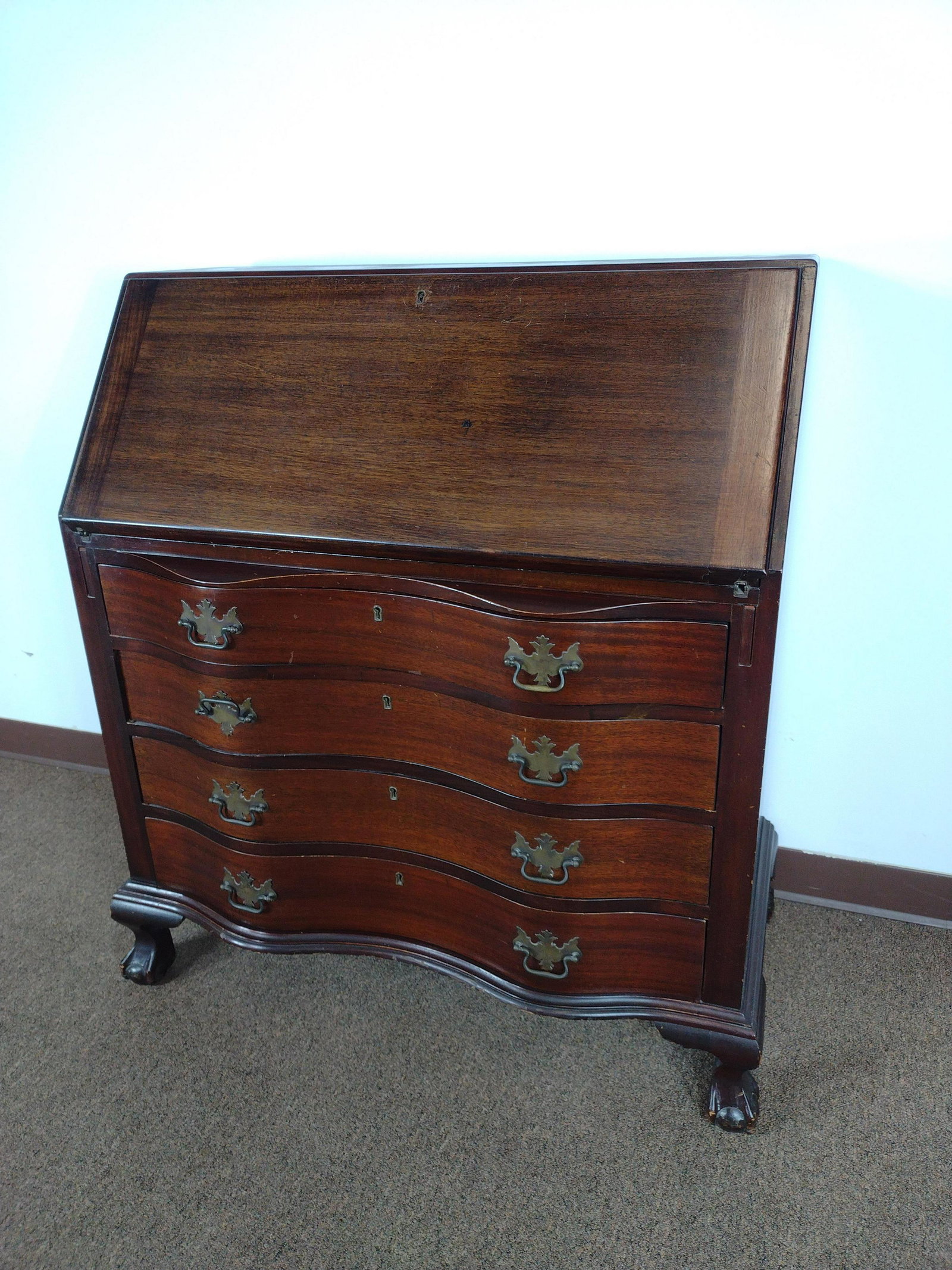 Serpentine Slant Front Desk: 36" wide X 19 1/2" deep X 41 1/2" high. IMPORTANT: Before bidding, please read the terms and conditions. When you registered for the auction you agreed to these terms and will be required to comply wi
