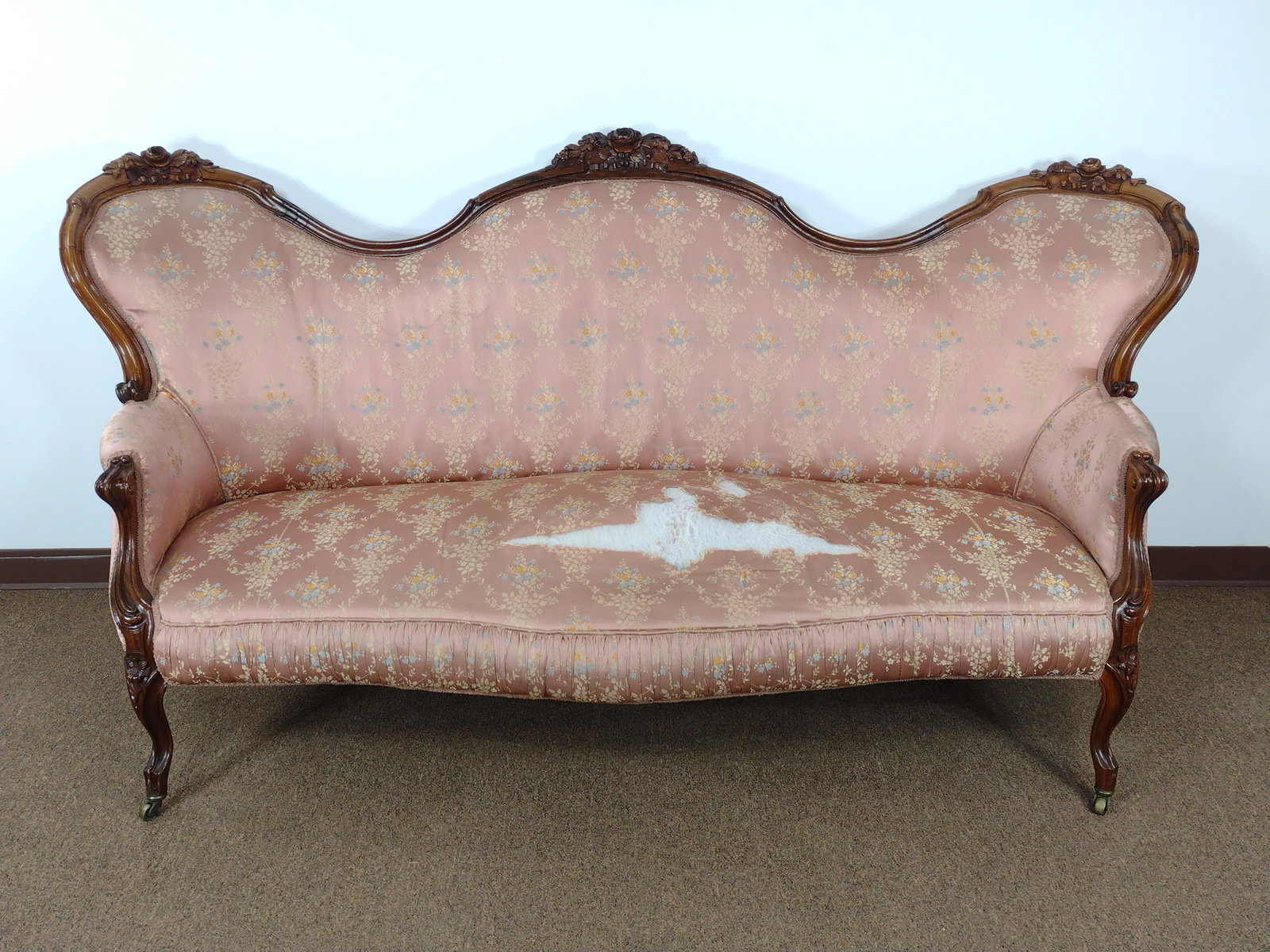 Victorian Settee: 82" wide x 28" deep x 40" high. Tears to upholstry. IMPORTANT: Before bidding, please read the terms and conditions. When you registered for the auction you agreed to these terms and will be required 
