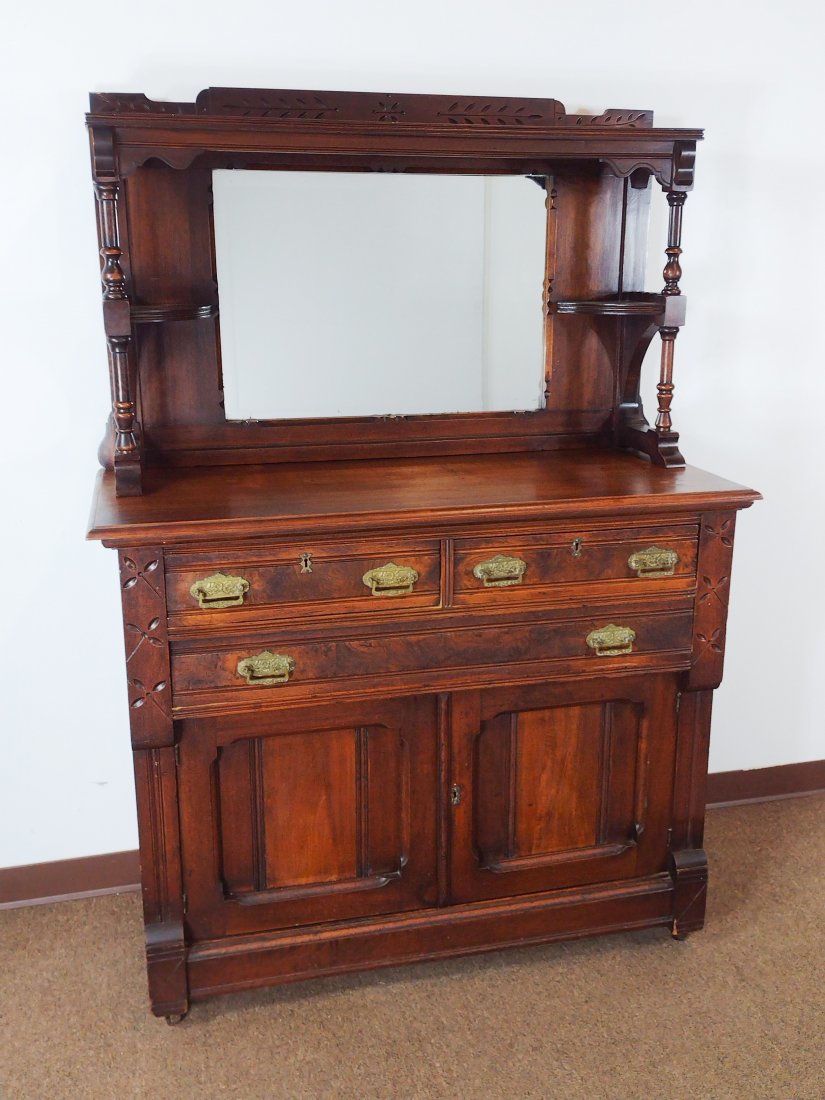 Antique Mirrored Back Buffet: 2 Part. 48" wide x 21" deep x 68" high. Minor surface wear. Some discoloration to top. IMPORTANT: Before bidding, please read the terms and conditions. When you registered for the auction you agreed t