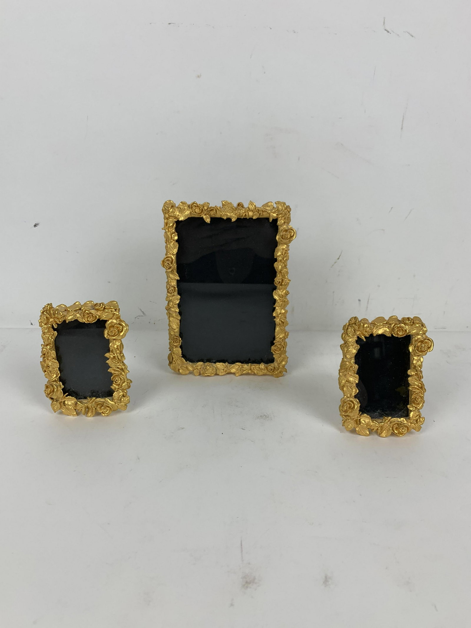 3 International Rose Picture Frames: 4” high x 2-3/4” wide to 6-1/2” high x 4-1/2” wide. IMPORTANT: Before bidding, please read the terms and conditions. When you registered for the auction you agreed to these ter