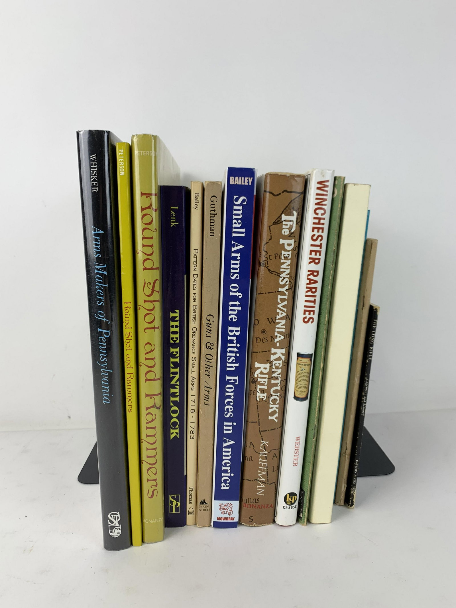 13 Books on Antique Firearms: Includes Winchester Rarities, The Pennsylvania-Kentucky Rifle, How to Covert Military Rifles, two copies of Round Shot and Rammers, Artillery Through the Ages, Sketches of Hunting Pouches, Powder Horn