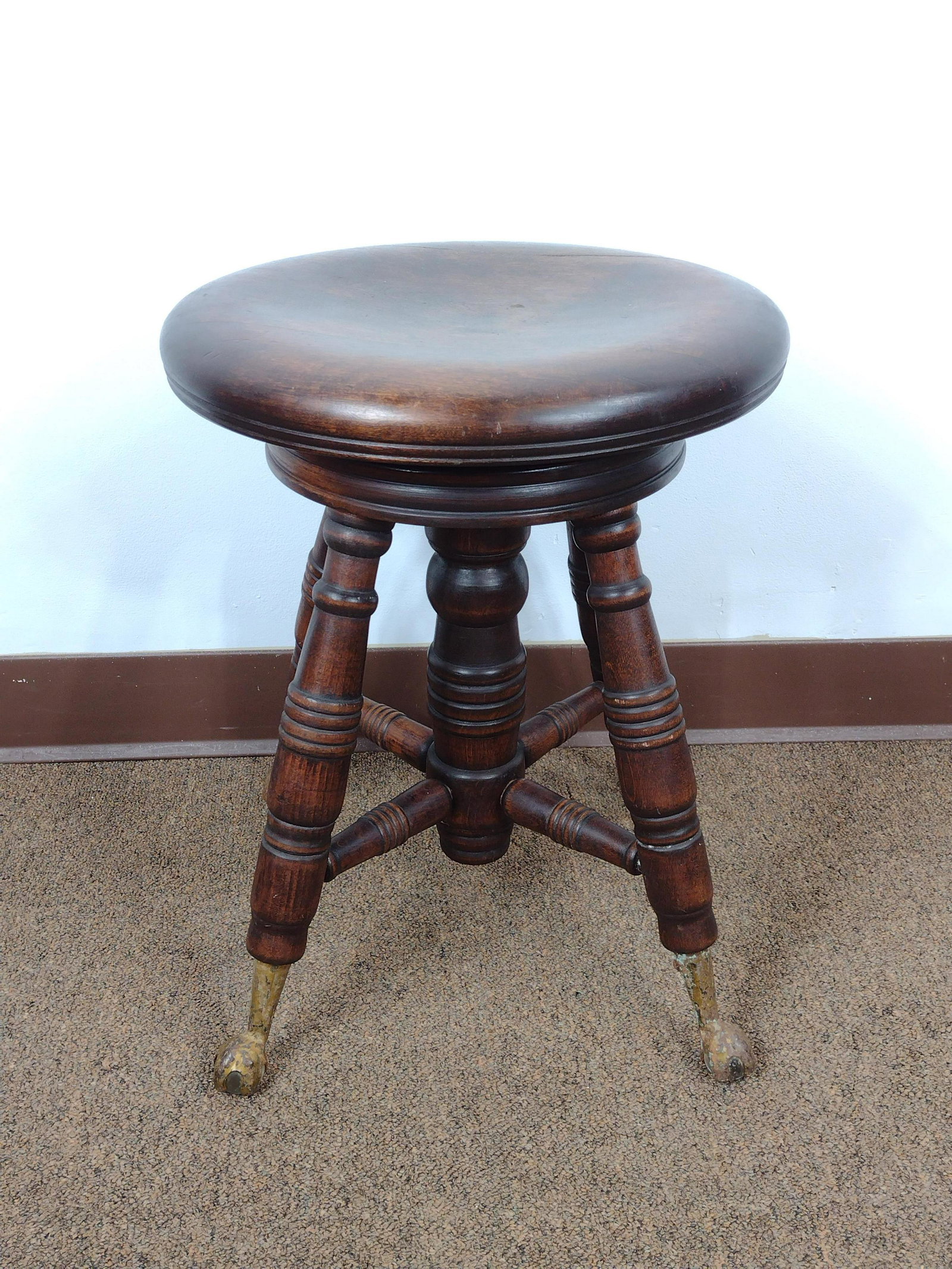 Ball & Claw Piano Stool: 19" diameter X 18" high. Paint loss and rust on claw feet. IMPORTANT: Before bidding, please read the terms and conditions. When you registered for the auction you agreed to these terms and will be re
